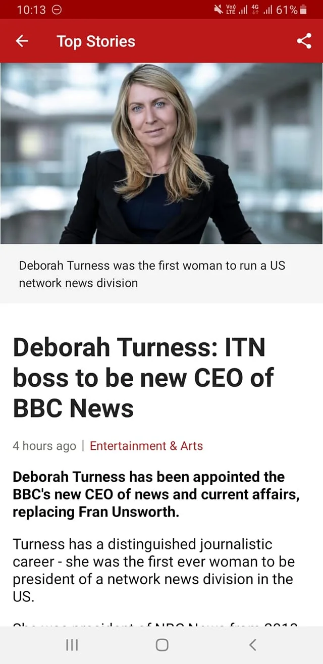 Deborah Turness is featured prominently in this screenshot from the BBC News app, which is titled "Deborah Turness: ITN boss to be new CEO of BBC News." The image at the top shows her in a professional setting, likely an office or similar environment, with a blurred background that emphasizes her presence. Her expression appears confident and poised. The lighting is bright and natural, giving the scene a clear and inviting look.
The text below the image announces her appointment as the new CEO of news and current affairs at BBC, succeeding Fran Unsworth. It highlights her historic achievement as the first woman to lead a network news division in the US. The story is part of the "Top Stories" section, underlining its importance. The succinct and formal presentation aligns with the BBC's reputation for delivering significant news updates.