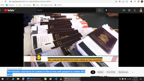 ```
The image is a screenshot from a YouTube video by the channel WION. The main focus is a stack of documents, prominently featuring Sri Lankan passports. The scene appears to be indoors with a close-up view of the passports and related paperwork spread across a table. The passports have a dark cover with the Sri Lankan emblem embossed in gold, creating a contrast against the white and colored documents beneath them. The lighting is bright enough to highlight the details on the passports and papers.
The header of the video boldly states, "The economic crisis forces Sri Lankans to flee as they seek passport to a better life," indicating a discussion about the economic situation in Sri Lanka and its impact on citizens. A caption at the bottom reads, "Sri Lankan PM predicts food crisis in the country," highlighting concerns about a looming crisis. The key on-screen text "COLOMBO, SRI LANKA" provides a geographic context, suggesting where this situation is unfolding.
The image is part of a broader narrative on the economic challenges faced by Sri Lankans, pushing many to seek opportunities abroad. The neatly organized documents suggest a formal setting, possibly an office or government institution where passport applications are processed. The presence of numerous passports implies a significant number of people are involved, further emphasizing the gravity of the crisis.