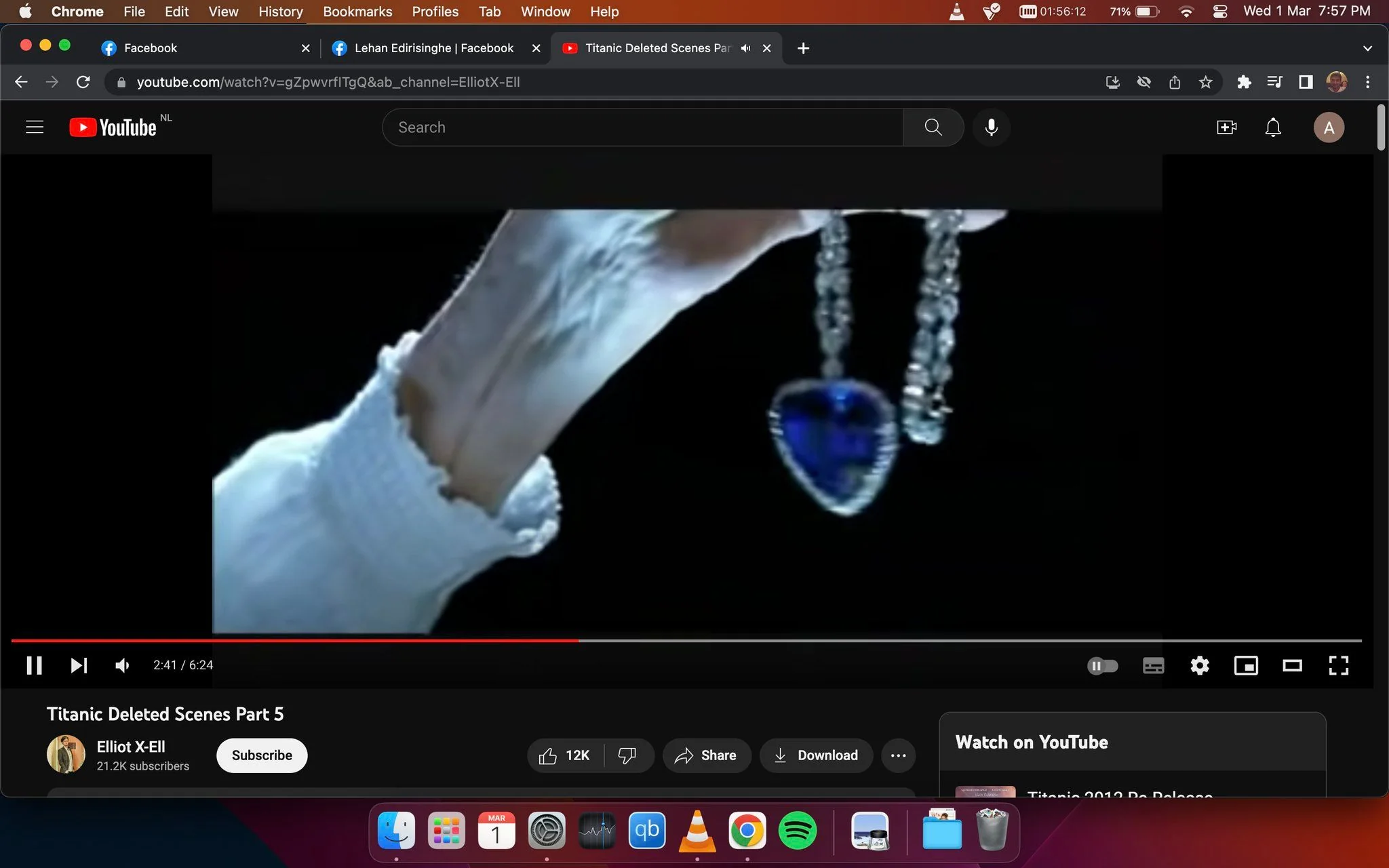 ```
The image is a screenshot from a YouTube video titled "Titanic Deleted Scenes Part 5," uploaded by the channel Elliot X-Ell. The scene showcases a close-up of a hand holding a blue heart-shaped necklace, prominently positioned in the center. The hand appears aged, suggesting significance or nostalgia, possibly relating to a scene from "Titanic." The necklace, known in the context of the film as the "Heart of the Ocean," is a key symbol. The lighting is dramatic, highlighting the blue gemstone and creating a sense of depth. The video is paused at 2:41 out of 6:24, and the interface shows options like share, download, and a subscribe button with "21.2K subscribers" noted. The environment is likely a digital platform, with YouTube's recognizable control icons visible at the bottom.
- Title: "Titanic Deleted Scenes Part 5"
- Channel / profile: "Elliot X-Ell"
- Site / app: "YouTube"