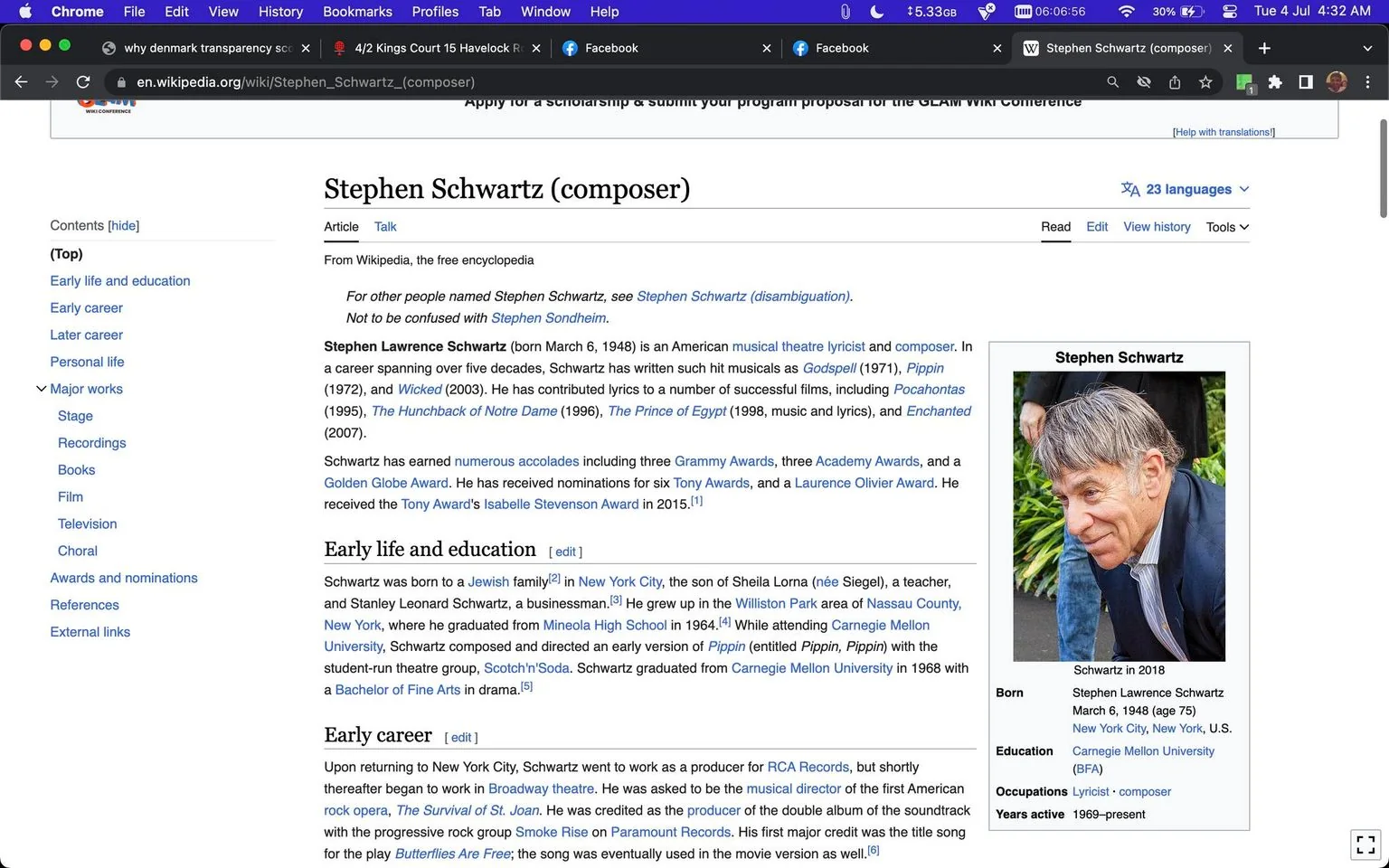 Stephen Schwartz's Wikipedia page provides an overview of his life and career as an esteemed American musical theatre lyricist and composer. The page details his birthdate, March 6, 1948, and his extensive career spanning over five decades. Notable works such as "Godspell," "Pippin," and "Wicked" are highlighted, along with contributions to films like "Pocahontas" and "Enchanted." The text mentions his numerous accolades, including three Grammy Awards and three Academy Awards, reflecting his significant impact on the industry. The page also covers his early life and education, noting his upbringing in New York City and his graduation from Carnegie Mellon University with a Bachelor of Fine Arts in drama. The accompanying image from 2018 shows Schwartz in a candid moment, dressed in a dark jacket and light shirt, seemingly engaged in conversation outdoors. The page offers a comprehensive look at Schwartz's achievements and contributions to musical theatre and film.