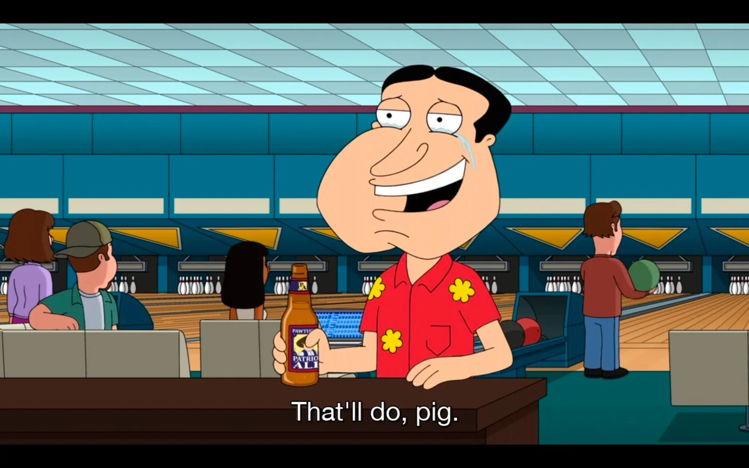 In this animated scene from "Family Guy," the character Quagmire is at a bowling alley. He is holding a bottle of "Pawtucket Patriot Ale" and has a cheerful expression, accentuated by a tear of joy on his face. Quagmire is wearing a red shirt adorned with yellow floral patterns. In the background, several people are engaged in bowling activities, with lanes and pins visible. The setting is a typical bowling alley, featuring blue walls and bright lights. The atmosphere is lively, indicative of social interaction and leisure. The caption displayed on the screen reads, "That'll do, pig." The style is in line with the show's signature animation, characterized by bold outlines and vibrant colors.