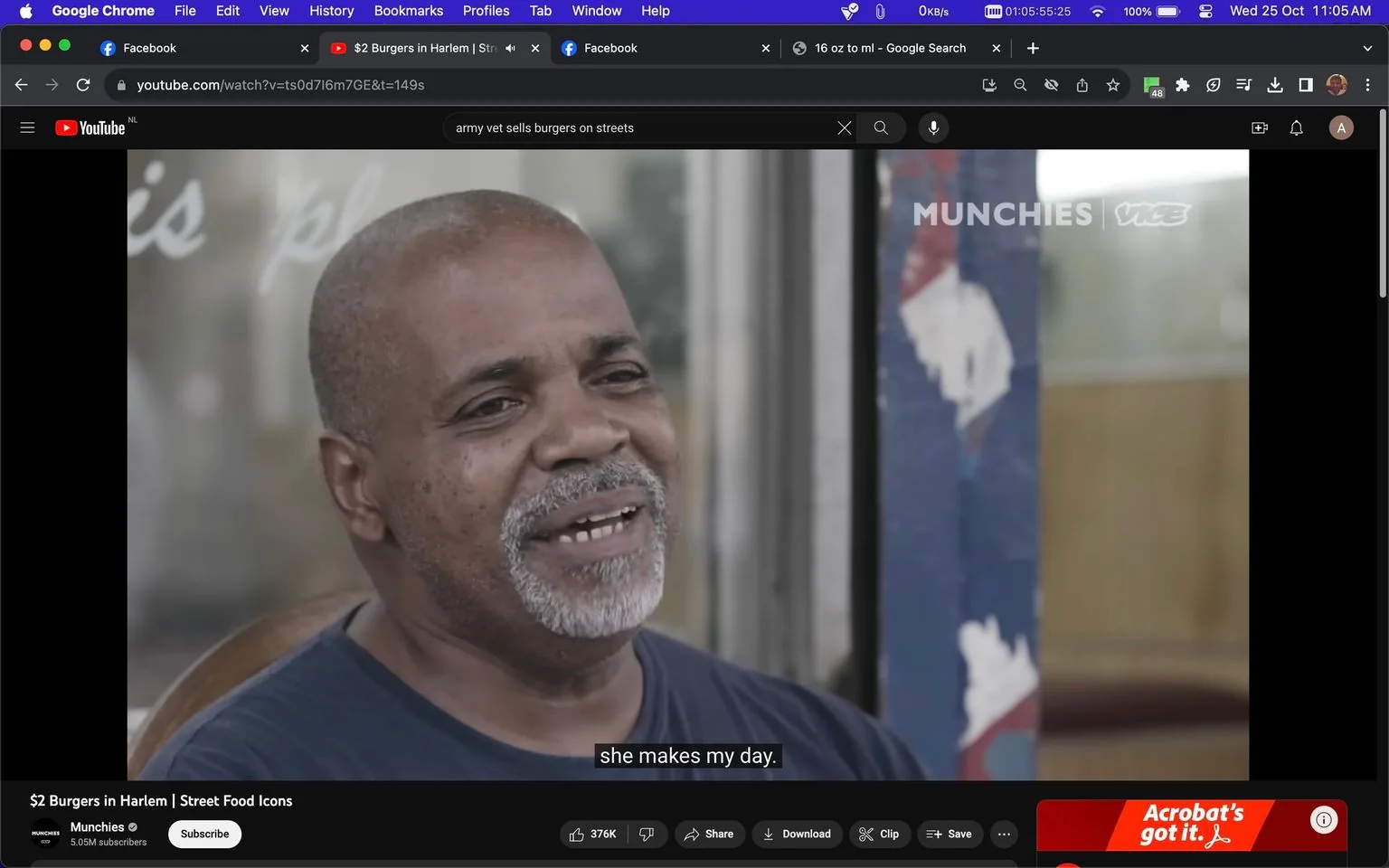 Leroy Maurice Robinson Jr. is featured in this image, which is a frame from a YouTube video titled "$2 Burgers in Harlem | Street Food Icons" by Munchies. The scene captures an interview moment, likely set outside given the natural lighting and subtle reflections on the glass behind him. Leroy Maurice is smiling warmly, conveying a welcoming and genial demeanor. He is dressed in a simple dark blue shirt, and his gray beard adds to his distinguished appearance. The background has a partially visible mural and glass with some text, creating an urban and artsy atmosphere typical of Harlem. The video is published by VICE, indicated by the MUNCHIES logo prominent in the top right corner. The subtitle "she makes my day" suggests a personal or heartfelt moment, adding to the human interest appeal of the scene.
- Title: "$2 Burgers in Harlem | Street Food Icons"
- Channel / profile: "Munchies"
- Site / app: "YouTube"
- Captions / subtitles: "she makes my day."