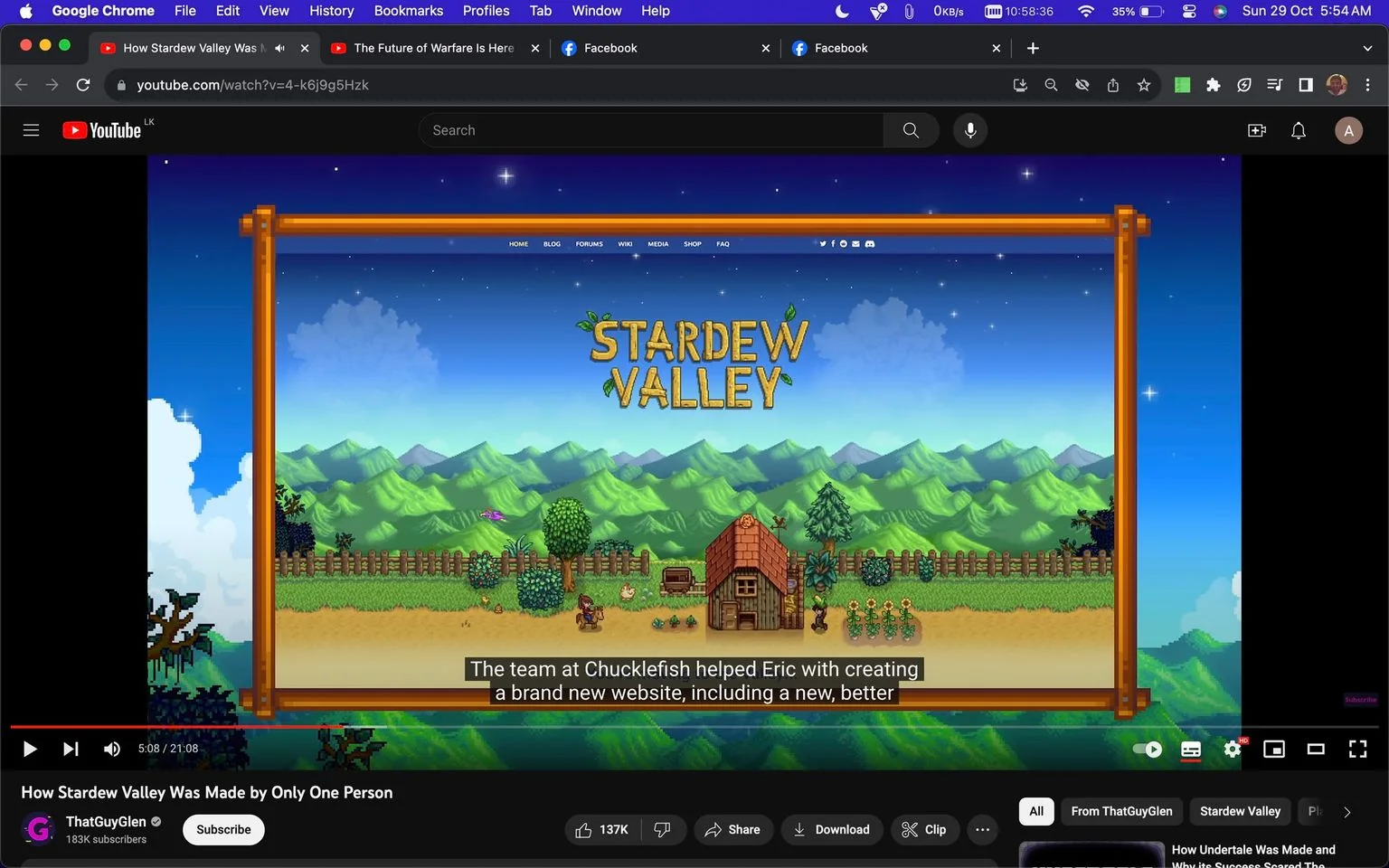 The screenshot depicts a YouTube video titled "How Stardew Valley Was Made by Only One Person" by the channel ThatGuyGlen. The video interface shows the typical YouTube layout, including the play button, video duration, and interactive options like thumbs up, share, and download. The video has a high engagement with 137K likes.
The main visual content is a screenshot from the game "Stardew Valley," showcasing its distinctive pixelated art style. In the scene, there is a rustic farm setting with a small wooden house, a few crops, and a farmer character. The background features rolling green hills under a starry night sky, encapsulating the serene and pastoral theme of the game. Above the scene, the title "STARD EW VALLEY" is prominently displayed.
Subtitles at the bottom mention that a team at Chucklefish assisted Eric in creating a new website, suggesting a collaborative effort in the game's promotion or distribution. The interface at the top of the screen includes navigation options like "HOME," "BLOG," "FORUMS," "WIKI," "MEDIA," "SHOP," and "FAQ," indicating a comprehensive online presence linked to the game.