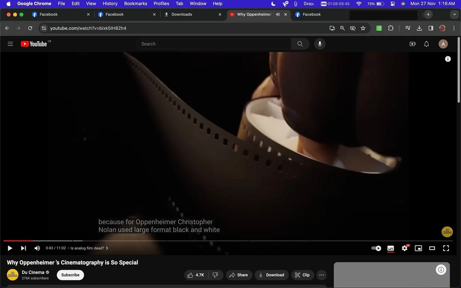 The screenshot displays a YouTube video titled "Why Oppenheimer's Cinematography is So Special" from the channel Du Cinema. The video focuses on the unique cinematographic techniques used in the film "Oppenheimer." The image shows a close-up of a film reel, emphasizing the traditional analog feel with its visible sprocket holes. The lighting is low, casting a warm, subtle glow that highlights the reel’s texture and adds a cinematic atmosphere. This visual choice underscores the video's discussion about the director Christopher Nolan's use of large format black and white film to create a distinctive visual style in "Oppenheimer." The YouTube interface is visible, including the like, share, and download options, with the video timeline indicating 43 seconds have elapsed. The dark theme of the browser complements the video's focus on film and cinematography. The visible subtitles mention Christopher Nolan's specific choice in cinematography for the film.
