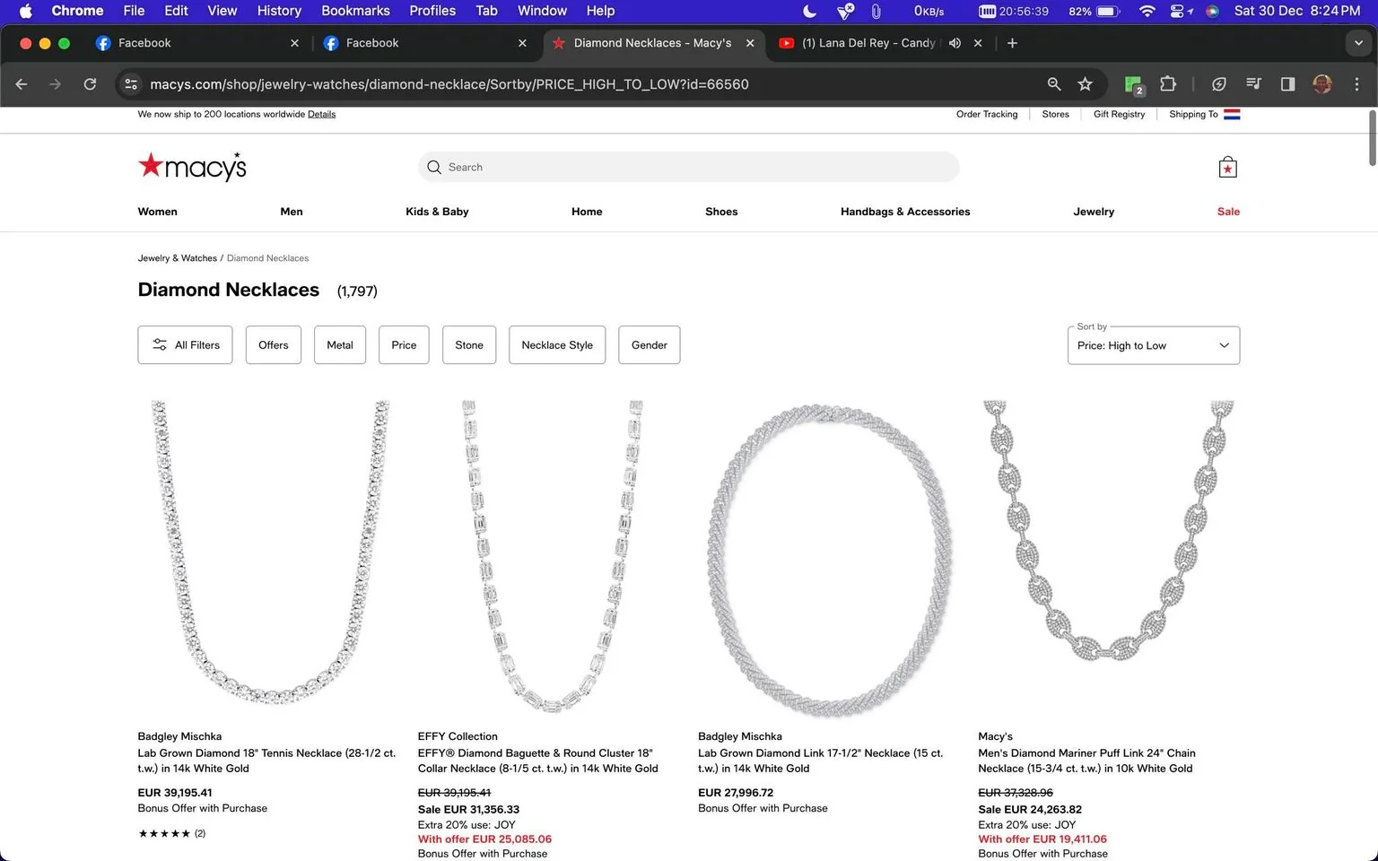 The image displays a webpage from Macy's featuring a selection of diamond necklaces. The page is titled "Diamond Necklaces" and shows products sorted by price from high to low. At the top, there are filters for different attributes like metal, price, and stone type. The first necklace is a Badgley Mischka Lab Grown Diamond 18" Tennis Necklace priced at EUR 39,195.41. Next, an EFFY Collection Diamond Baguette & Round Cluster 18" Collar Necklace is shown with a discount, priced at EUR 31,356.33. A Badgley Mischka Lab Grown Diamond Link 17-1/2" Necklace follows at EUR 27,996.72. Finally, Macy's Men's Diamond Mariner Puff Link 24" Chain Necklace is offered at a sale price of EUR 24,263.82. The page layout is organized, with each product accompanied by its name, price, and available discounts. The website's branding is evident at the top, and the background is a clean white, highlighting the jewelry.
- Title: "Diamond Necklaces"
- Site / app: "macy's"