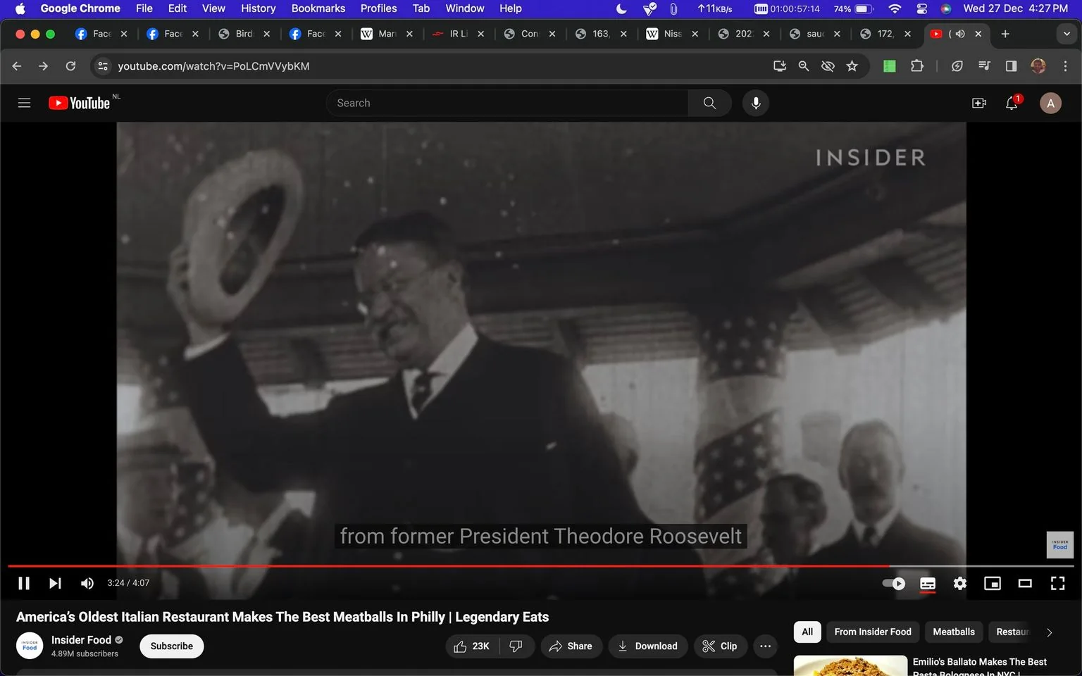 The screenshot is from a YouTube video titled "America’s Oldest Italian Restaurant Makes The Best Meatballs In Philly | Legendary Eats," presented by Insider Food. The scene features a black-and-white historical image of a man waving a hat, identified in the subtitles as "former President Theodore Roosevelt." He is captured in an outdoor setting, under a pavilion adorned with American flag motifs. The mood is celebratory, as Roosevelt appears to be greeting a crowd, indicated by his raised arm and the visible expression of a smile. The video is likely exploring the historical connections of the restaurant being featured, with this specific frame tying in past notable figures. The overall composition is typical of historical footage, adding a sense of depth and authenticity to the narrative. The video belongs to the Insider channel, known for its engaging food and culture content.