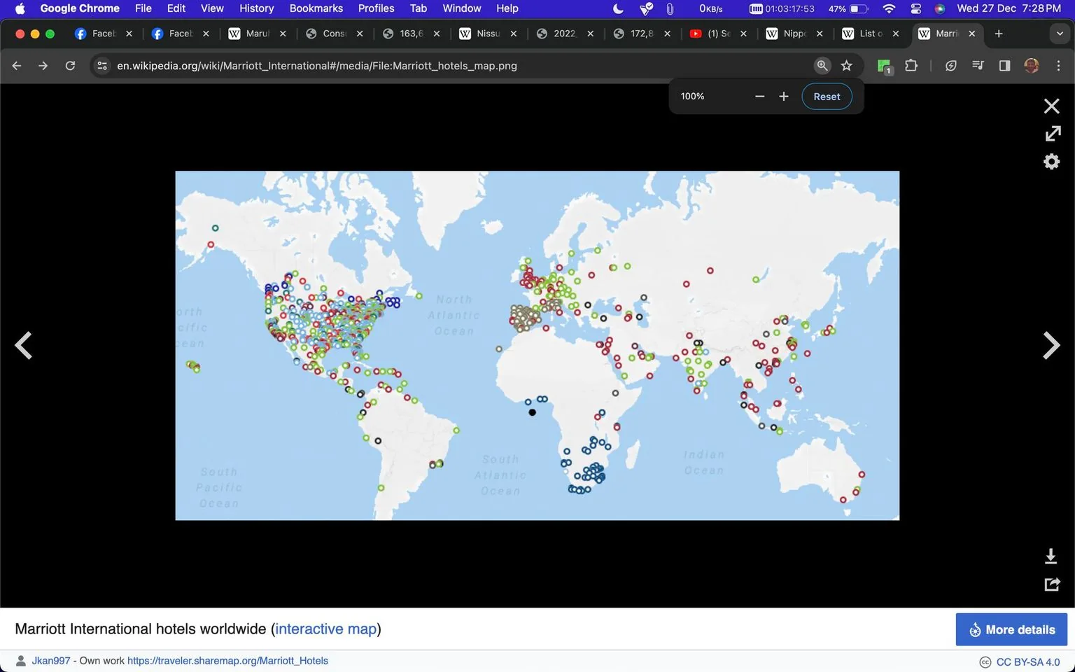 The image is a screenshot from Wikipedia, featuring a world map labeled "Marriott International hotels worldwide." The map is dotted with various colored markers indicating the locations of Marriott hotels globally. These markers are concentrated heavily in North America, Europe, and parts of Asia, with fewer in regions like Africa and South America. The map is interactive, allowing users to explore different areas for hotel locations. The background is a typical map style with light blue oceans and white continents. The title and map attribution indicate it was created by Jkan997, with a link to an interactive version. The browser interface shows it's being viewed on Google Chrome, with multiple tabs open along the top, and the computer's status bar displaying the time and battery level.
- Title: "Marriott International hotels worldwide"
- Site / app: "Wikipedia"