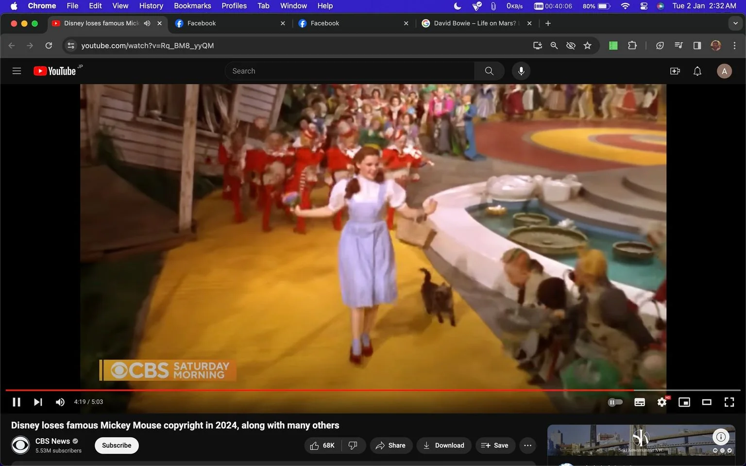 The image is a frame from a YouTube video titled "Disney loses famous Mickey Mouse copyright in 2024, along with many others," uploaded by the channel CBS News. The scene depicted is from the classic film "The Wizard of Oz." It shows a character, Dorothy, in her iconic blue dress with ruby slippers, walking with a small dog, Toto, along the yellow brick road. Surrounding her are many characters dressed in vibrant costumes, adding a festive and lively atmosphere.
In the background, there are colorful structures and a circular path, typical of the whimsical setting of the film. The scene is bright and vivid, capturing the magical and nostalgic essence of this classic movie. The text "CBS SATURDAY MORNING" is visible on the lower part of the screen, indicating the network's branding.
This frame is part of a discussion on copyright issues related to notable characters and films, as suggested by the video title. The overall mood is cheerful and dynamic, reflecting the joyful and musical elements of "The Wizard of Oz."
