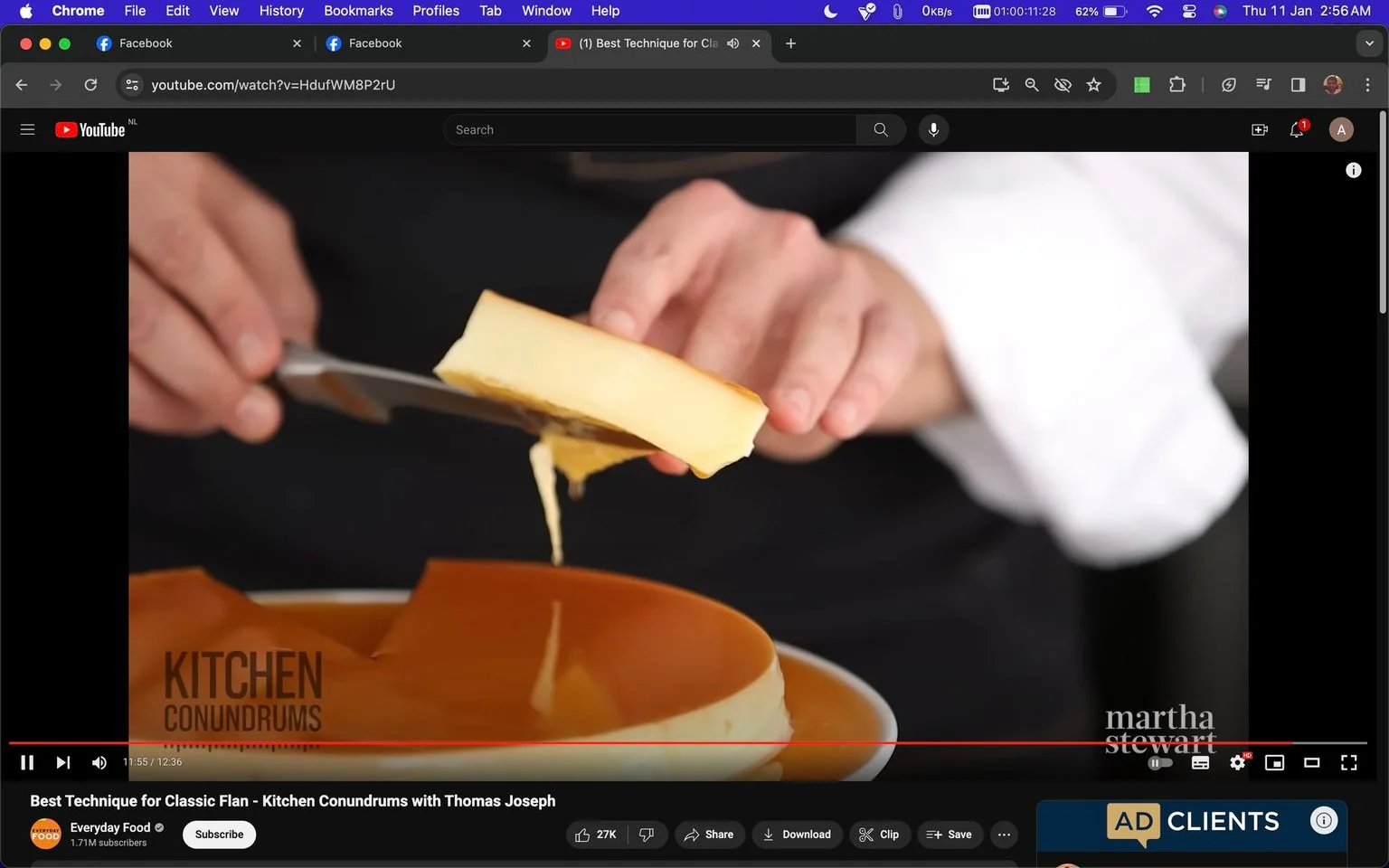 The image is a screenshot from a YouTube video titled "Best Technique for Classic Flan - Kitchen Conundrums with Thomas Joseph" on the channel Everyday Food, associated with Martha Stewart. The video is likely a cooking demonstration focused on making flan. In the foreground, a person is handling a piece of flan with a knife, preparing to serve it. The creamy texture of the flan is evident, and a rich caramel sauce is visible on the plate below. The individual is wearing a dark outfit with a white sleeve visible, which suggests a cooking or professional kitchen setting. The screenshot captures a moment of precision, highlighting the delicate handling of the dessert. The text "KITCHEN CONUNDRUMS" appears on the video, emphasizing the educational aspect of the content. The lighting is bright, typical of a studio kitchen environment, aiming to clearly showcase the cooking process.