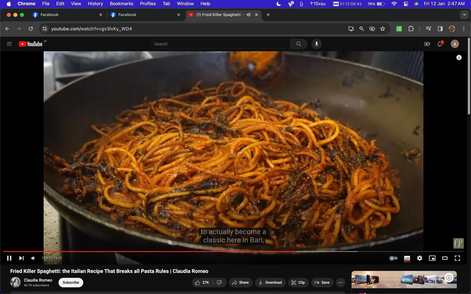 The screenshot shows a YouTube video titled "Fried Killer Spaghetti: the Italian Recipe That Breaks all Pasta Rules | Claudia Romeo," on the channel Claudia Romeo. The video is paused at 12:17 out of 19:15 minutes. A frying pan filled with spaghetti is visible, showcasing a dish with strands of pasta that appear crispy and browned, suggesting a unique preparation that deviates from traditional pasta cooking methods. The spaghetti is coated in a rich, red sauce, with some pieces showing signs of caramelization or charring.
The YouTube interface includes controls at the bottom, with options to like, dislike, share, download, clip, and save the video. The subtitle on-screen reads, "to actually become a classic here in Bari," referencing the location and possibly the origin of the dish. The video seems to focus on a non-traditional approach to cooking pasta, likely exploring innovative or unconventional techniques. The environment appears to be a kitchen with a stovetop, emphasizing the cooking process.