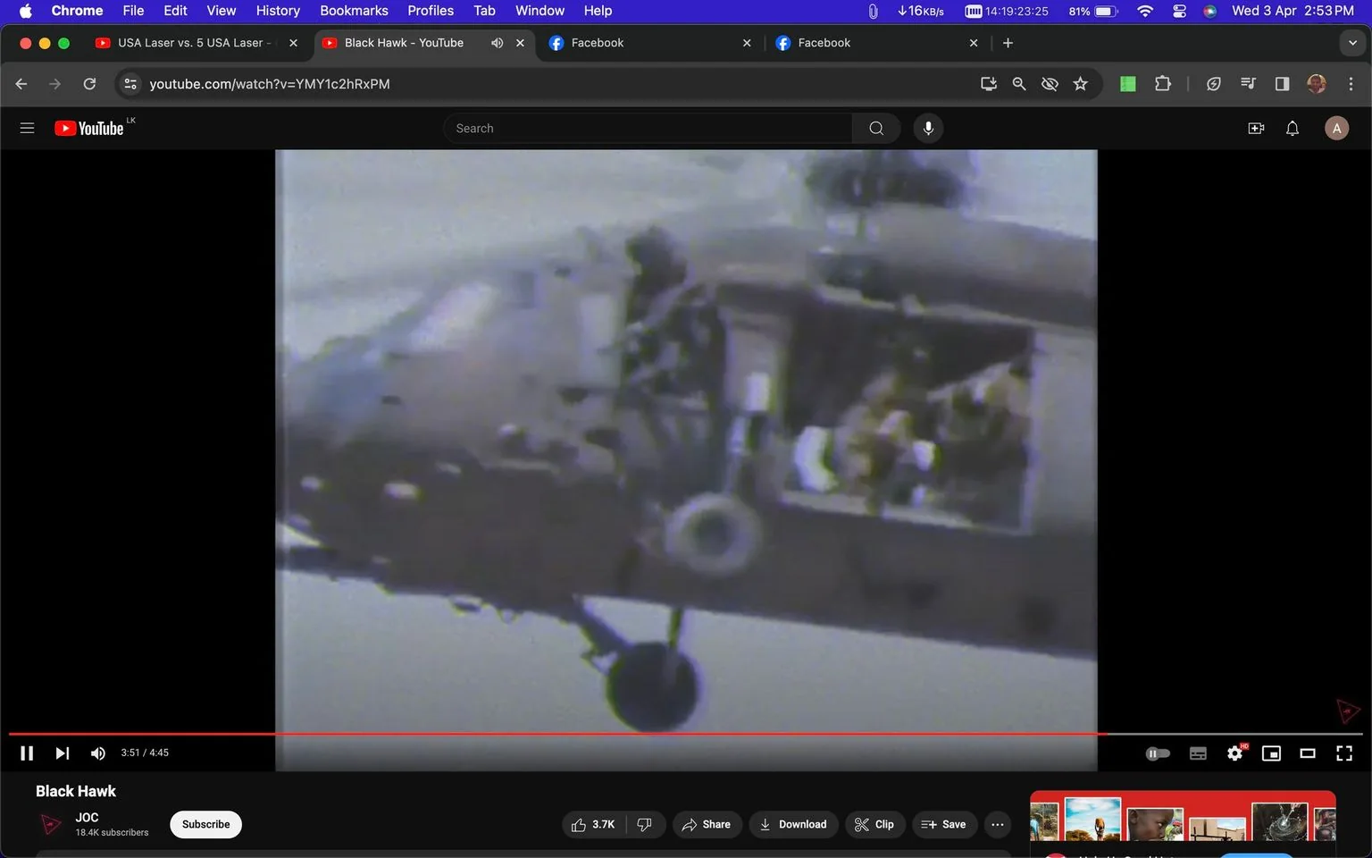 The screenshot captures a YouTube video titled "Black Hawk" on the JOC channel. The scene shows a military helicopter, specifically a Black Hawk, in mid-flight. The helicopter is viewed from the side, with an open door revealing personnel inside. The image has a vintage, slightly grainy quality, suggesting it could be from archival footage or a historical reenactment. The helicopter's rotors are blurred due to motion, indicating it is actively flying. The lighting appears overcast, consistent with a cloudy day, contributing to the muted color palette. The bottom of the screen shows typical YouTube video interface elements like play/pause controls, a timeline, and interaction buttons (e.g., share, save). The video is almost complete, with the timeline nearing the end. The context suggests a focus on military aviation or historical events involving Black Hawk helicopters.
- Title: "Black Hawk"
- Channel / profile: "JOC"
- Site / app: "YouTube"