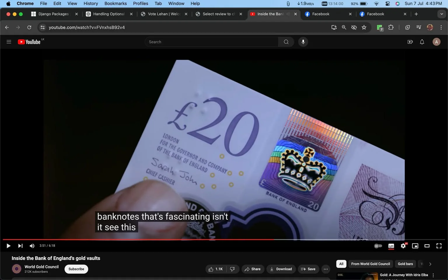 The image is a frame from a YouTube video titled "Inside the Bank of England's gold vaults," uploaded by the World Gold Council channel. The video is paused at 3:51, showing a close-up of a £20 banknote from the Bank of England. The banknote features intricate security details, including a holographic element with a crown and colorful stripes. The text on the note reads "£20" and includes "LONDON FOR THE GOVERNOR AND COMPANY OF THE BANK OF ENGLAND" along with the signature of "Sarah John," labeled as the Chief Cashier. The lighting is focused, highlighting the hologram and printed text, adding emphasis to the security features of the note. The background is dark, drawing attention to the banknote held by a hand in the foreground. Subtitles are displayed at the bottom of the frame, reading "banknotes that's fascinating isn't it see this," indicating a discussion about the banknote. The video explores the topic of currency and its security features as part of the Bank of England's operations.