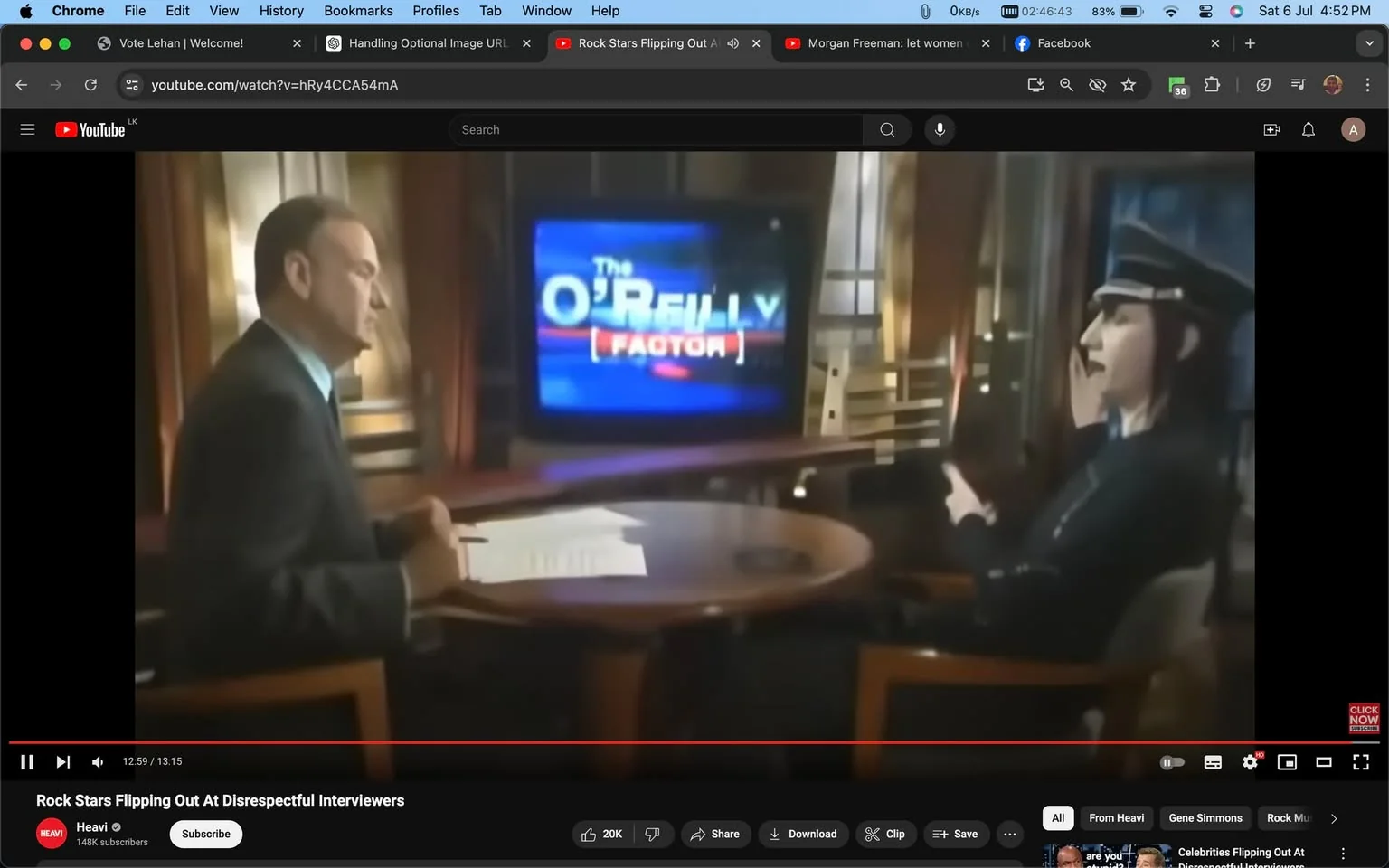 In this video frame from YouTube, the setting is an indoor television studio where an interview is taking place. The scene features two individuals seated at a round wooden table. On the left side is a man who appears to be Bill O'Reilly, based on the hint provided, wearing a dark suit and light blue shirt. He holds a pen and some papers, suggesting he is actively engaging in the interview process. Across the table, another individual is dressed in a black outfit with a distinctive black hat with white trim, appearing relaxed and leaning back in the chair.
Behind them, a television screen prominently displays the title "The O'Reilly Factor," confirming the broadcast context. The lighting in the studio is warm and professional, with soft illumination highlighting the participants and enhancing the formal atmosphere. The YouTube channel is named "Heavi," and the video is titled "Rock Stars Flipping Out At Disrespectful Interviewers," indicating a focus on dramatic interview moments. The overall mood conveys a serious and professional interaction typical of a televised interview setting.