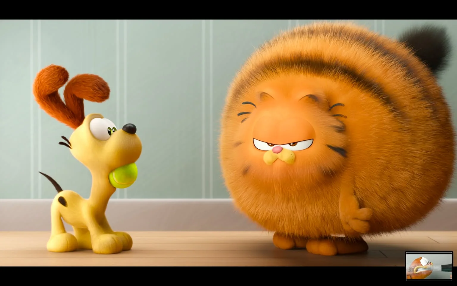 The image depicts a humorous scene featuring Garfield, the famous orange tabby cat, and Odie, his canine companion. Garfield is humorously depicted as extremely round and fluffy, with a grumpy expression on his face, characteristic of his laid-back and sarcastic personality. His fur is a vibrant orange with black stripes, and his eyes are half-closed in a typical unimpressed manner. Odie, the yellow dog with floppy ears, is standing on the left, holding a green ball in his mouth. His wide eyes and playful stance contrast with Garfield's disgruntled demeanor, highlighting their comedic dynamic. The setting appears to be indoors, indicated by the wooden floor and light-colored wall in the background. The illustration is bright and colorful, typical of animated cartoon styles, emphasizing the playful and whimsical nature of the characters.