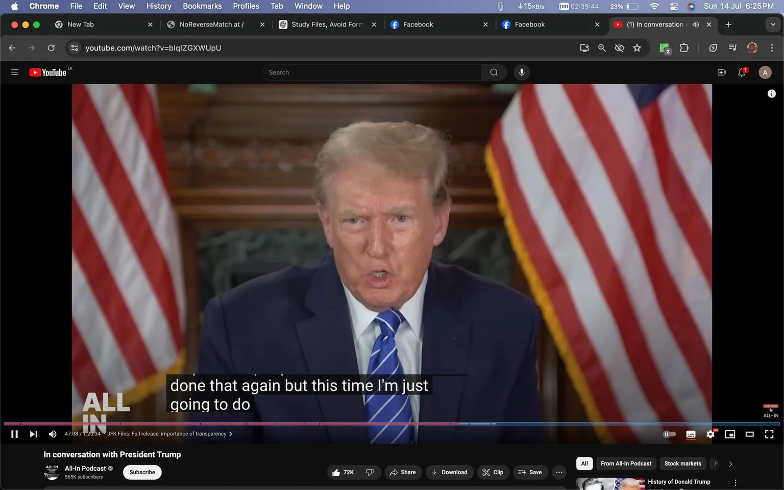 1) Rich description: The screenshot is from a YouTube video titled "In conversation with President Trump" on the "All-In Podcast" channel. The scene features Donald Trump sitting in a formal indoor setting, with two American flags prominently displayed in the background. Donald Trump is wearing a dark suit with a blue-striped tie, and he appears to be speaking directly to the camera. His expression is focused and serious, suggesting a formal interview or discussion. The lighting is balanced, highlighting his features and the setting. The YouTube interface is visible, showing options like "Subscribe," "Share," and "Save." The video progress bar is at about 47 minutes into a 1-hour and 20-minute video. Subtitles are enabled, displaying the text "done that again but this time I'm just going to do."
2) On-screen text block:
- Title: "In conversation with President Trump"
- Channel / profile: "All-In Podcast"
- Site / app: "YouTube"
- Captions / subtitles: "done that again but this time I'm just going to do"