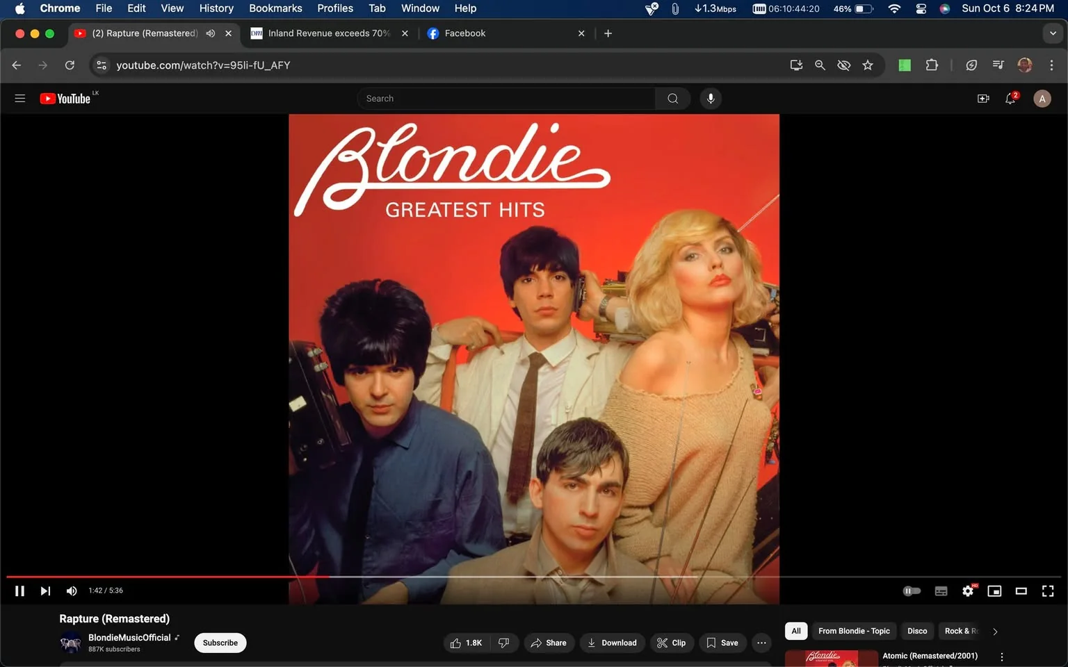 The screenshot is from a YouTube video titled "Rapture (Remastered)" on the BlondieMusicOfficial channel. It prominently features the cover of Blondie's "Greatest Hits" album. The image displays the band members of Blondie in a group photo against a vibrant red background. The members are styled in retro fashion typical of the era, with bold hairstyles and expressive poses. The band name "Blondie" is written in a cursive white font at the top, followed by "GREATEST HITS" in smaller block letters. The image conveys a nostalgic and energetic aesthetic, capturing the iconic style of the band.
- Title: "Rapture (Remastered)"
- Channel / profile: "BlondieMusicOfficial"
- Site / app: "YouTube"