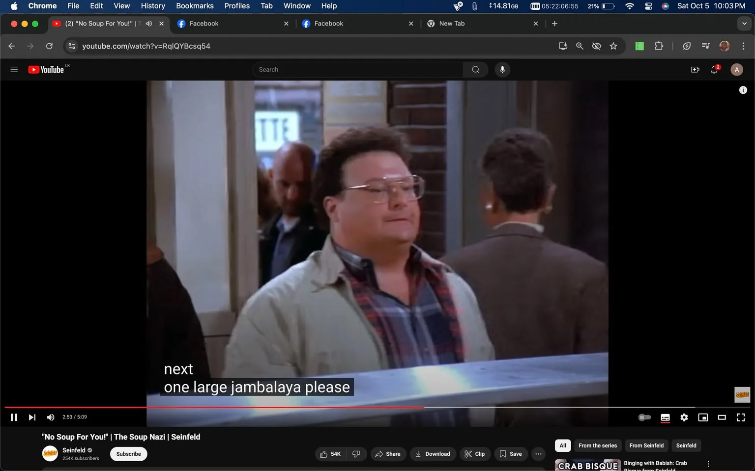 The screenshot is from a YouTube video titled "No Soup For You! | The Soup Nazi | Seinfeld," featured on the Seinfeld channel. It depicts a scene from the TV show "Seinfeld," specifically an iconic episode involving the character known as the "Soup Nazi." In the image, a man wearing glasses, a plaid shirt, and a light-colored jacket is standing in line at a restaurant, presumably to order soup. The setting is indoors, resembling a fast-paced New York soup stand with a busy atmosphere.
The background shows other patrons and a glimpse of the restaurant's inner decor, including brick walls. The man's expression suggests anticipation or confidence as he prepares to place his order. The caption overlaid reads, "next one large jambalaya please," indicating his request to the server. The scene is well-lit, emphasizing the bustling environment typical of the show. The platform displaying this video is YouTube, as indicated by the site's interface elements visible in the screenshot.
- Title: "No Soup For You! | The Soup Nazi | Seinfeld"
- Channel / profile: "Seinfeld"
- Site / app: "YouTube"
- Captions / subtitles: "next one large jambalaya please"