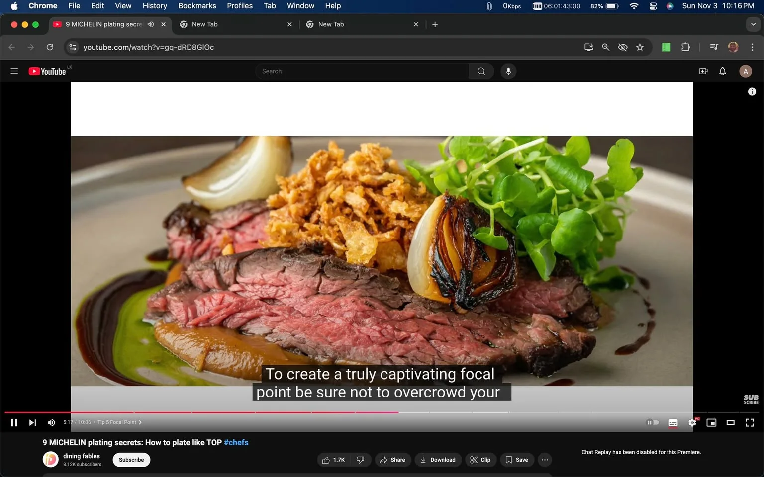 A beautifully plated dish is showcased in this video frame from YouTube, titled "9 MICHELIN plating secrets: How to plate like TOP #chefs," hosted on the channel "dining fables." The image captures a gourmet dish consisting of perfectly cooked slices of steak, their juicy, pink interiors exposed. The steak is garnished with crispy fried onions, charred onions, and fresh greens, adding texture and color contrast to the composition. A smooth sauce, perhaps a purée, appears beneath the meat, while a drizzle of a darker sauce encircles it, both enhancing the visual appeal and flavor profile.
The plating demonstrates a careful balance, avoiding overcrowding to create a captivating focal point, as highlighted in the subtitles. The dish is presented on a neutral-toned plate that complements the vibrant colors of the food, enhancing its visual allure. The lighting is soft yet bright, drawing attention to the textures and colors, emphasizing the meticulous detail that Michelin-level plating requires. This presentation not only appeals to the eyes but also suggests a sophisticated culinary experience.
- Title: "9 MICHELIN plating secrets: How to plate like TOP #chefs"
- Channel / profile: "dining fables"
- Site / app: "YouTube"
- Captions / subtitles: "To create a truly captivating focal point be sure not to overcrowd your"