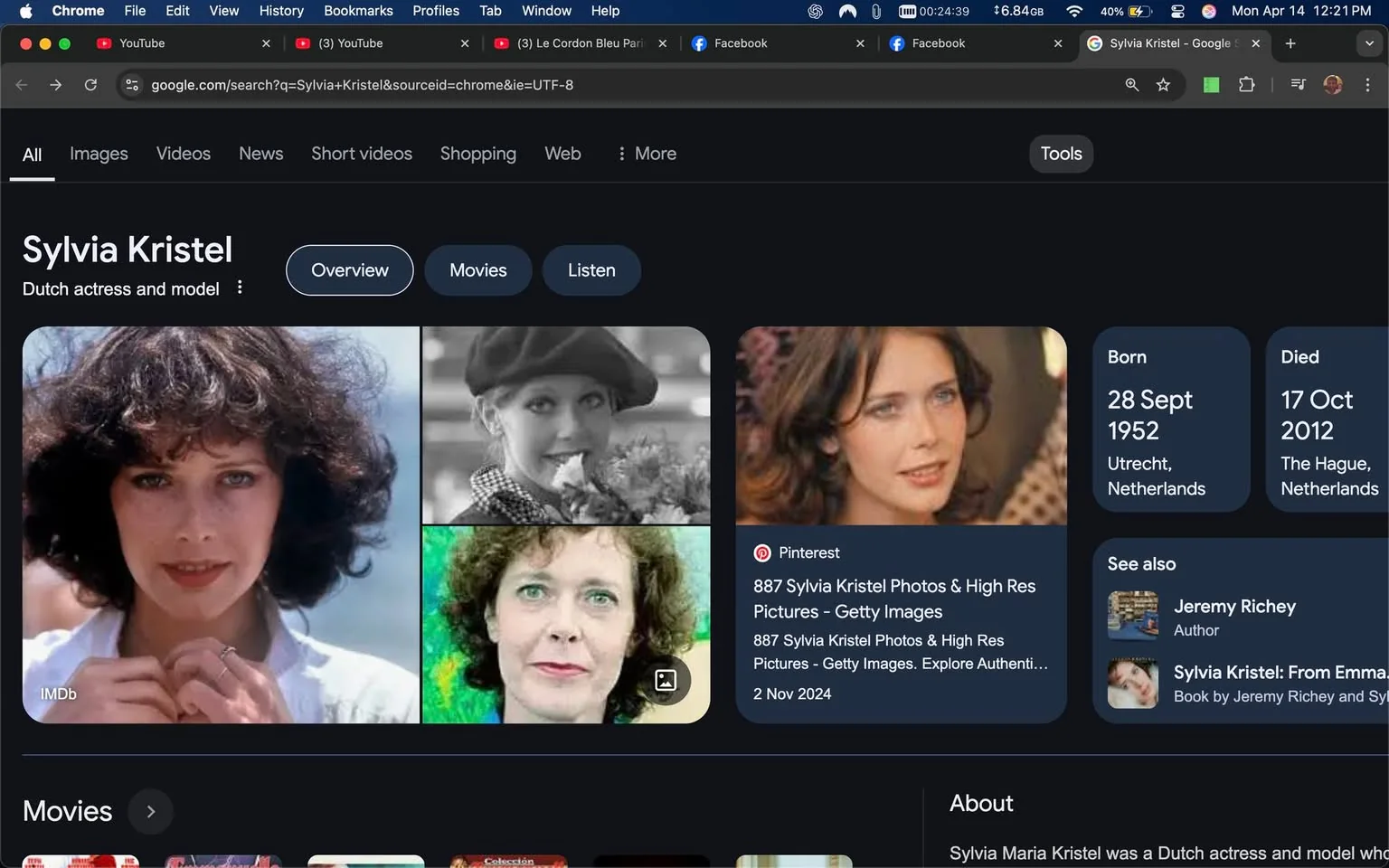 The image displays a Google search results page for "Sylvia Kristel," a Dutch actress and model. The background is dark, with a layout typical of Google's interface. 

**Readable Text:**
- The top of the page features the search term "Sylvia Kristel."
- Below the search bar, there are tabs labeled "All," "Images," "Videos," "News," "Short videos," "Shopping," "Web," and "More."
- There are sections labeled "Overview," "Movies," and "Listen."
- On the right side, there are details about Sylvia Kristel, including:
  - "Born: 28 Sept 1952, Utrecht, Netherlands"
  - "Died: 17 Oct 2012, The Hague, Netherlands"
- Additional sections include "See also" with the name "Jeremy Richey" listed as an author, and a book titled "Sylvia Kristel: From Emma."

**Images:**
- The main section contains four images of a woman, presumably Sylvia Kristel, arranged in a grid format.
  - The first image shows her with curly hair, wearing a white blouse, and holding her hands together in front of her.
  - The second image is in black and white, showing her wearing a hat and smiling while holding flowers.
  - The third image features her with curly hair and a neutral expression against a colorful background.
  - The fourth image shows her with long, wavy hair and a soft smile, wearing a light-colored top.

**Logos and Brands:**
- The first image has an "IMDb" logo in the bottom left corner, indicating a connection to the Internet Movie Database.

**Setting and Background:**
- The overall setting is a digital interface, specifically a search results page, with no physical location or environmental context visible.

**Appearance:**
- The woman in the images has varying hairstyles, including curly and wavy textures. Her expressions range from neutral to smiling, suggesting a variety of moods captured in different contexts.

This description captures all observable details without speculation or subjective interpretation.