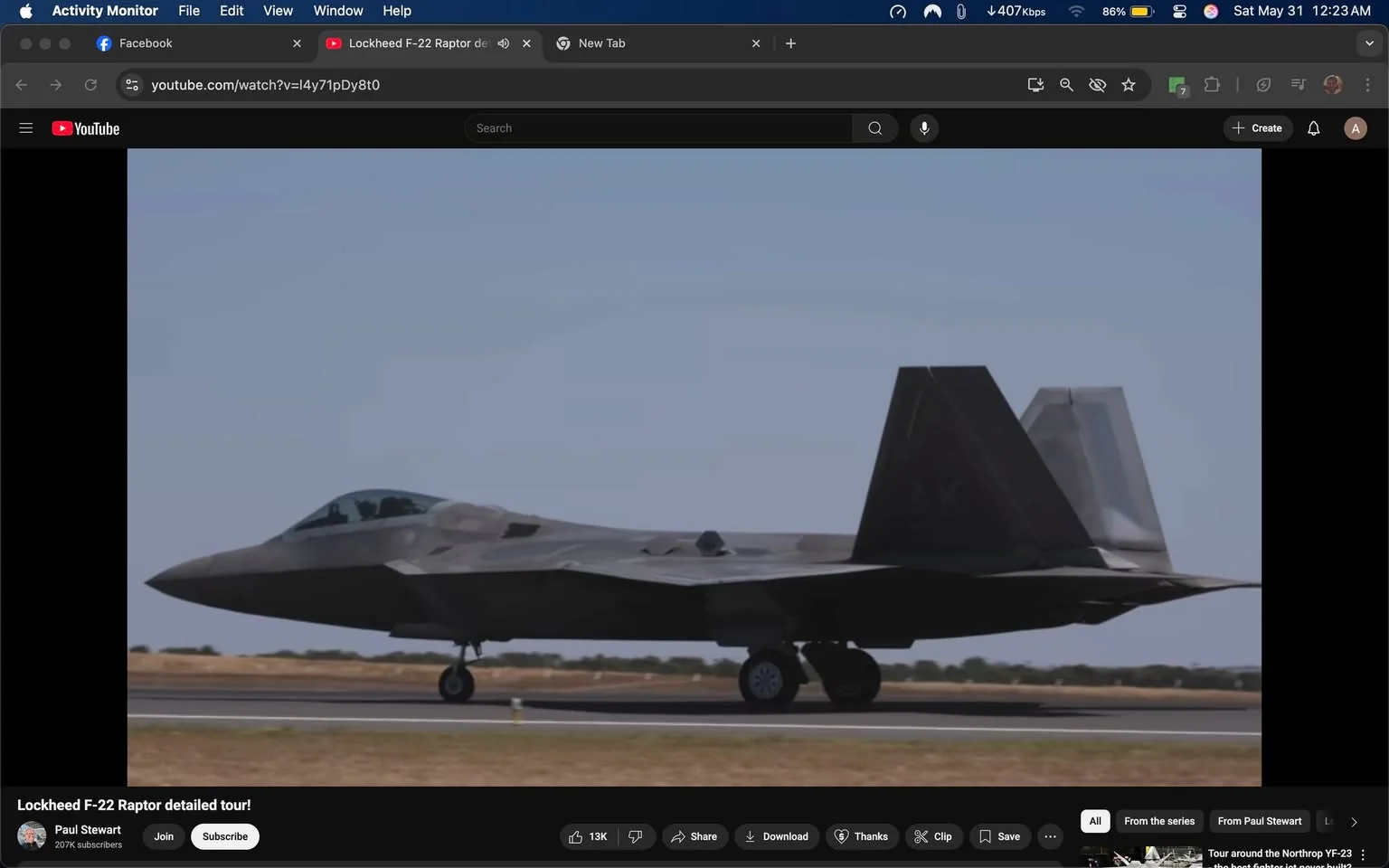 The image depicts a Lockheed F-22 Raptor, a stealth tactical fighter aircraft, positioned on a runway. The aircraft is primarily gray with a matte finish, which is characteristic of stealth technology. The fuselage is sleek and angular, designed for aerodynamic efficiency and reduced radar visibility. 

The cockpit is located at the front of the aircraft, featuring a large, tinted canopy that provides visibility for the pilot. The nose of the aircraft is pointed and slightly downward, enhancing its aerodynamic profile. 

The wings are swept back and feature a unique design that contributes to the aircraft's agility and stealth capabilities. The tail section consists of two vertical stabilizers, which are also angled and have a dark color scheme. The left stabilizer has a visible marking that appears to be a letter "K," possibly indicating the aircraft's squadron or base.

The landing gear is deployed, with two main wheels visible under the fuselage and a smaller nose wheel at the front. The runway surface is visible, with a light brown grass area surrounding it, suggesting an airfield environment.

The background features a clear blue sky, indicating good weather conditions. There are no other aircraft or people visible in the immediate vicinity, emphasizing the focus on the F-22 Raptor.

Overall, the image captures the advanced design and capabilities of the F-22 Raptor in a clear and unobstructed manner.