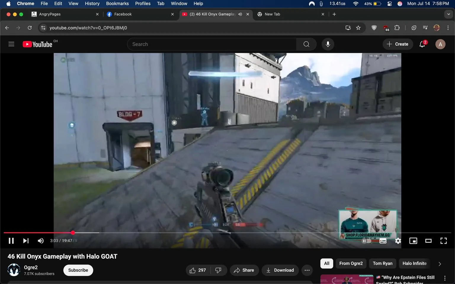 The image displays a gameplay video from a YouTube channel titled "Ogre2," featuring a first-person shooter scene from "Halo Infinite." The screen shows a character holding a weapon, positioned on a sloped surface with a yellow-striped path leading up. The environment is a futuristic, industrial setting with a white building labeled "BLDG - 7" prominently visible. 

In the background, mountains are visible under a clear blue sky, suggesting an outdoor map. The player’s HUD indicates health and ammo status, with a blue marker possibly representing a teammate or objective. The video is timestamped at 3:03 of a 19:47 total duration. 

The tone appears competitive and focused, typical of gaming content, with an emphasis on skill and strategy. There are no visible facial expressions or gestures, as this is a gameplay video. The context suggests a high-stakes gaming scenario, likely aimed at showcasing impressive gameplay, as indicated by the title "46 Kill Onyx Gameplay with Halo GOAT."