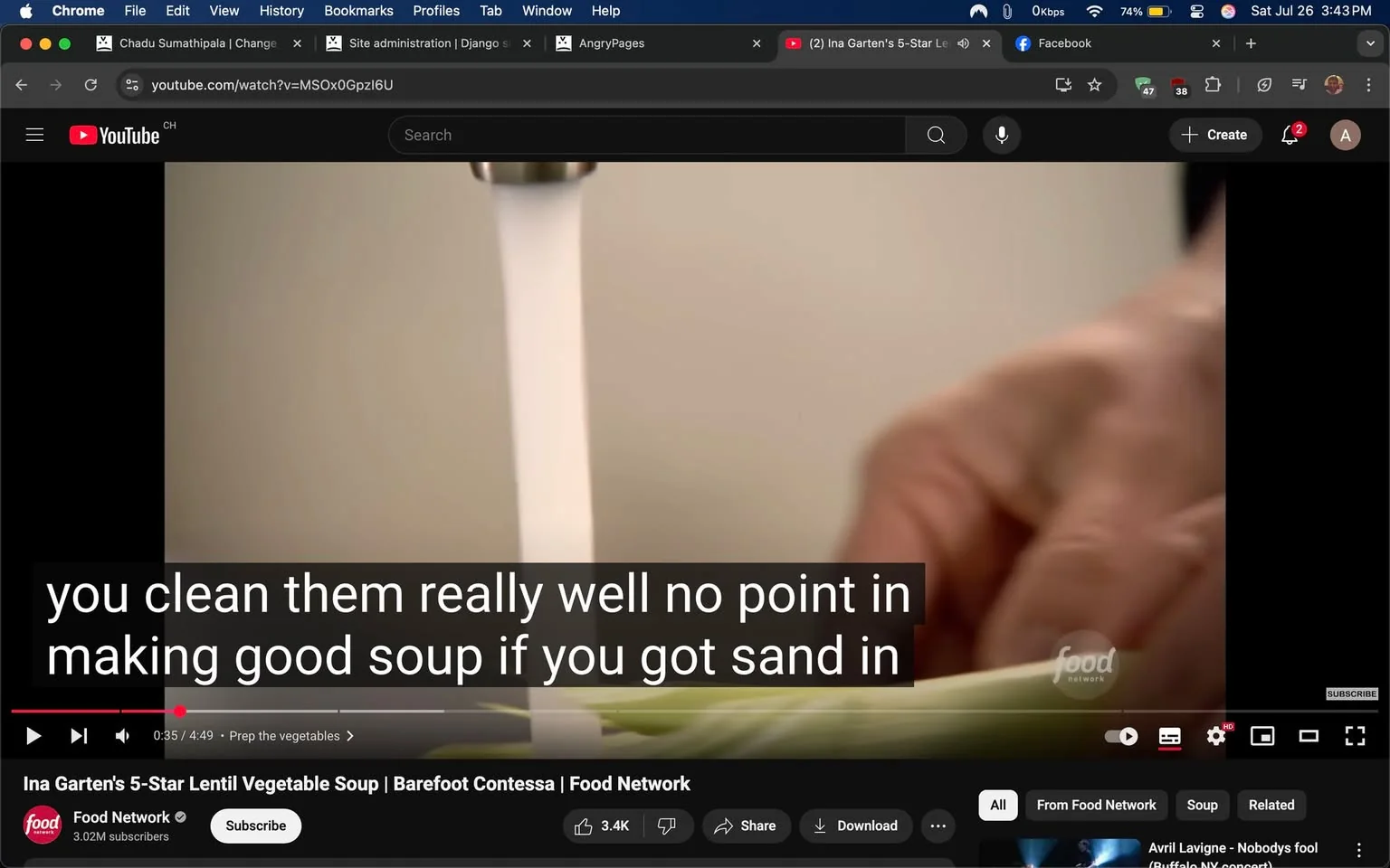 The image captures a scene from a cooking video on YouTube, specifically from a channel associated with the Food Network. The video is titled "Ina Garten's 5-Star Lentil Vegetable Soup," featuring a close-up of a hand preparing ingredients for the soup.

In the foreground, a hand is seen gently holding a stalk of celery, which is being rinsed under a stream of water from a faucet. The water flows in a smooth, clear cascade, highlighting the freshness of the celery. The hand appears to be focused and careful, suggesting a methodical approach to cooking. The background is softly blurred, emphasizing the action at hand and creating a warm, inviting atmosphere typical of cooking shows.

The video includes subtitles that convey instructions or commentary, stating, "you clean them really well no point in making good soup if you got sand in." This line reflects a practical and straightforward approach to cooking, emphasizing the importance of cleanliness in food preparation. It suggests that the speaker values quality and attention to detail, which is often a hallmark of good cooking.

The branding of the Food Network is visible in the bottom left corner, with the logo prominently displayed. This adds a layer of credibility and familiarity for viewers who may recognize the channel as a trusted source for culinary inspiration. The subscriber count of 3.02 million indicates the channel's popularity and the appeal of the content being shared.

The overall tone of the image is warm and inviting, evoking a sense of comfort that comes from home cooking. The act of washing vegetables is a fundamental step in preparing a meal, and the focus on this task suggests a nurturing approach to cooking. The viewer might feel inspired to engage in their own culinary adventures, motivated by the simplicity and joy of preparing fresh ingredients.

The setting appears to be a kitchen, likely well-lit and designed for cooking, which adds to the overall ambiance. The colors are soft and natural, with the green of the celery contrasting beautifully against the neutral tones of the background. This visual harmony enhances the appeal of the cooking process, making it seem both accessible and enjoyable.

In summary, the image encapsulates a moment of culinary preparation, highlighting the importance of cleanliness and care in cooking. The combination of visual elements, branding, and the spoken content creates an engaging narrative that invites viewers to appreciate the art of making a delicious soup.