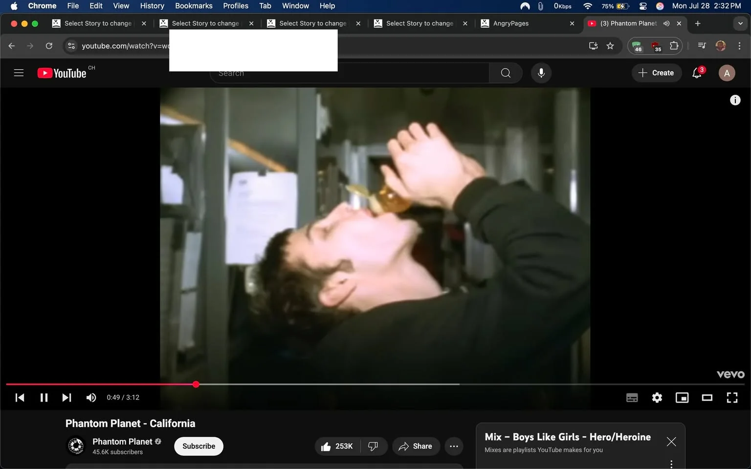 The image captures a scene from a music video on YouTube, specifically from the song "California" by Phantom Planet. The video plays at a timestamp of 49 seconds into a total duration of 3 minutes and 12 seconds. 

In the foreground, a young man is prominently featured, tilting his head back as he drinks from a bottle. His expression suggests a mix of enjoyment and abandon, as if he is fully immersed in the moment. The lighting is somewhat muted, giving the scene a slightly nostalgic or gritty feel, reminiscent of early 2000s music videos. The man has short, dark hair and is wearing a black hoodie, which adds to the casual, carefree vibe of the scene.

Behind him, the background is somewhat blurred but hints at a cluttered environment, possibly a backstage area or a small venue. There are papers pinned to a surface, suggesting a workspace or a place where plans are made. The overall atmosphere feels intimate and spontaneous, as if capturing a fleeting moment of youthful exuberance.

The YouTube interface is visible at the top of the image, with the video title "Phantom Planet - California" displayed prominently. Below the video, there are buttons for liking, sharing, and subscribing, indicating the interactive nature of the platform. The subscriber count of 45.6K suggests that the band has a dedicated following, though they may not be mainstream.

The overall tone of the image evokes a sense of nostalgia, capturing the essence of youth, freedom, and the carefree spirit often associated with California. The act of drinking from the bottle could symbolize a celebration or a moment of escape, aligning with the themes often explored in music from that era.

In summary, this image encapsulates a moment of youthful exuberance, set against the backdrop of a music video that likely resonates with themes of freedom and the carefree lifestyle associated with California. The visual elements, combined with the context of the song, create a vivid snapshot of a specific cultural moment.