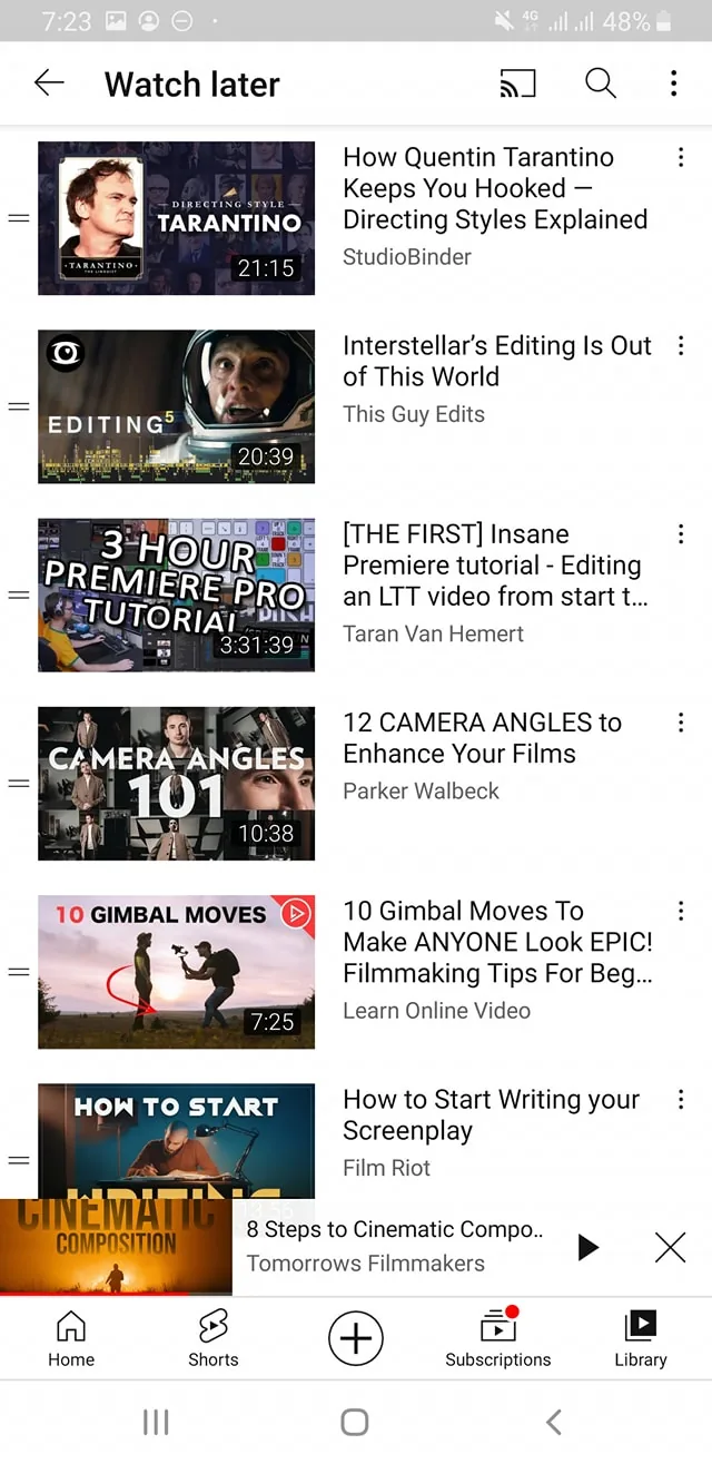 The image is a screenshot from the YouTube app, displaying a "Watch later" playlist. It features a list of videos related to filmmaking, directing, and editing techniques. At the top of the list is a video titled "How Quentin Tarantino Keeps You Hooked — Directing Styles Explained" by StudioBinder, which highlights Quentin Tarantino's directing styles. Below it is "Interstellar’s Editing Is Out of This World" by This Guy Edits, focusing on the editing techniques used in the film "Interstellar."
Another video, "[THE FIRST] Insane Premiere tutorial - Editing an LTT video from start t..." by Taran Van Hemert, offers a comprehensive tutorial on using Premiere Pro software. Parker Walbeck's "12 CAMERA ANGLES to Enhance Your Films" suggests various camera angles to improve filmmaking. "10 Gimbal Moves To Make ANYONE Look EPIC! Filmmaking Tips For Beg..." by Learn Online Video provides tips on using a gimbal for dynamic shots. "How to Start Writing your Screenplay" by Film Riot gives insights into screenplay writing. At the bottom, "8 Steps to Cinematic Compo..." from Tomorrows Filmmakers focuses on cinematic composition techniques.
The layout is a typical YouTube app interface, with video thumbnails, titles, and durations visible. The app's navigation bar with icons for Home, Shorts, Subscriptions, and Library is found at the bottom. The screenshot captures a moment with a battery level of 48%, and the time is 7:23.