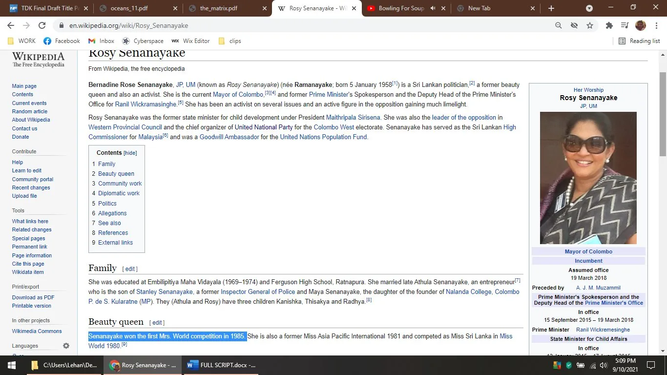 The image is a screenshot from Wikipedia, featuring a detailed profile of Rosy Senanayake, a Sri Lankan politician and former beauty queen. The page is titled "Rosy Senanayake - Wikipedia" and belongs to The Free Encyclopedia. In the screenshot, there is a photograph of Rosy Senanayake on the right side, showing her wearing sunglasses and a traditional saree, indicating a formal and professional appearance.
The information on the page highlights her significant roles, including her current position as the Mayor of Colombo, and her past roles such as Prime Minister’s Spokesperson and State Minister for Child Affairs. The profile outlines her achievements, including winning the first Mrs. World competition in 1985, and her activism and leadership roles, such as being a leader of the opposition in the Western Provincial Council.
The webpage is structured with a contents box and sections detailing her family, career, and achievements. Her biography emphasizes her political influence and her contributions to society both as a politician and as a beauty queen. The page also touches on her educational background and personal life, providing a comprehensive overview of her life and career.