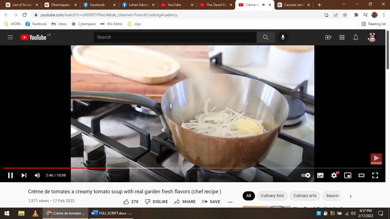 The screenshot captures a YouTube video titled "Crème de tomates a creamy tomato soup with real garden fresh flavors (chef recipe)" from the "FrenchCookingAcademy" channel. The scene is set in a kitchen, where a cooking process is underway. In the foreground, a metal pot sits on a stovetop, with visible slices of onion and a pat of butter being sautéed inside. The heat from the stove creates a subtle steam, indicating the cooking activity. The pot's copper surface reflects the ambient light, adding a warm glow to the scene.
In the background, there are blurred kitchen elements, including a wooden cutting board and a white jar, reinforcing the culinary environment. The video is paused at 2:46 of its total 10:08 duration. The interface of YouTube is visible, with options to like, dislike, share, and save the video, as well as a subscribe button for the channel. The lighting in the scene is bright and clear, typical of a well-lit kitchen setting, enhancing the vibrant and inviting atmosphere of the cooking process. The video appears to focus on demonstrating a recipe for a creamy tomato soup, emphasizing fresh ingredients and culinary techniques.