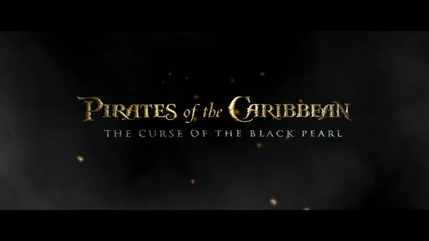 The image is a title screen from the movie "Pirates of the Caribbean: The Curse of the Black Pearl." The background is dark, giving a mysterious and adventurous mood, fitting the theme of the film. The title "PIRATES of the CARIBBEAN" is prominently displayed in large, gold lettering, which stands out against the dark backdrop. Below it, in smaller white text, is the subtitle "THE CURSE OF THE BLACK PEARL," indicating this is the first installment in the Pirates of the Caribbean film series. There are small, glowing embers scattered across the image, adding a dynamic and atmospheric touch. This design effectively captures the adventurous and fantastical spirit of the movie. The text is centered, making it the focal point of the image.