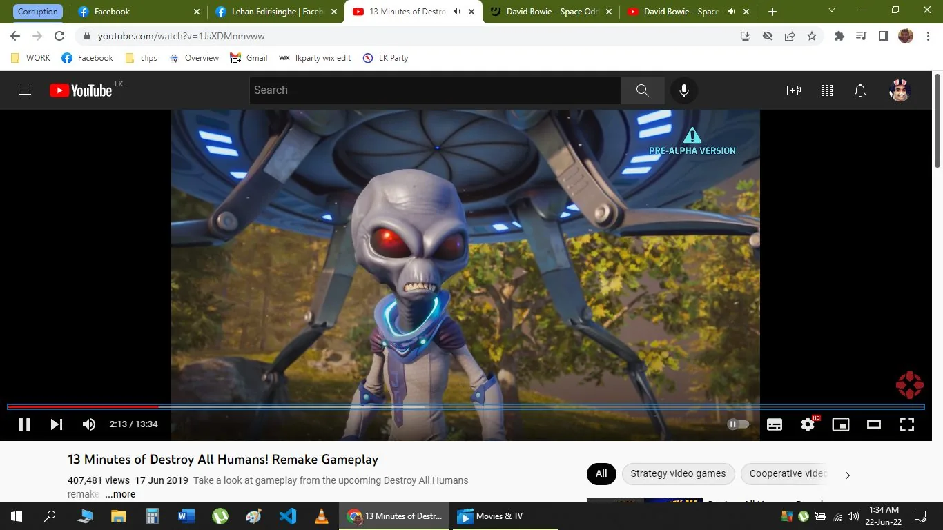 The image is a screenshot from YouTube, featuring a video titled "13 Minutes of Destroy All Humans! Remake Gameplay." The video has accumulated 407,481 views and was published on June 17, 2019. The scene highlights an alien character, who appears to be the protagonist from the game "Destroy All Humans! Remake." This character is shown standing outdoors, in front of a spaceship, with vibrant autumn foliage in the background. The alien has large, red eyes and a serious expression, wearing a futuristic suit with glowing blue accents that add to the sci-fi atmosphere. The lighting is bright and clear, emphasizing the details of the character and the environment. There is an on-screen label indicating that this is a "PRE-ALPHA VERSION" of the game, suggesting early footage of the game development. The YouTube interface shows common elements like the play button, video duration, and view count.