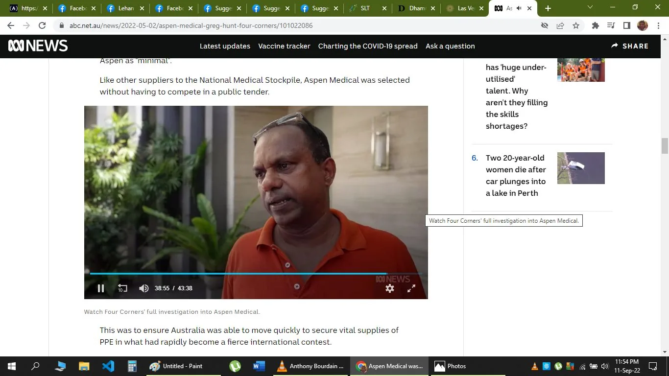 1) Rich description: The screenshot is from an ABC News page, displaying a video segment from the program "Four Corners." The scene features a man wearing an orange polo shirt, presumably Nimal Perera, based on the hint provided. He appears to be in an interview setting, standing outdoors with greenery in the background. The lighting is natural, indicating it's daytime. His expression is serious, suggesting a discussion of a significant topic. The ABC News logo is visible in the bottom corner of the video. The page discusses Aspen Medical's selection to supply the National Medical Stockpile without a public tender during the COVID-19 pandemic, emphasizing the urgency of securing PPE. Text below the video invites viewers to watch the full investigation by "Four Corners" into Aspen Medical.
2) On-screen text block:
- Title: "Aspen Medical Greg Hunt Four Corners"
- Channel / profile: "ABC NEWS"
- Site / app: "abc.net.au"
- Captions / subtitles: "Watch Four Corners’ full investigation into Aspen Medical."