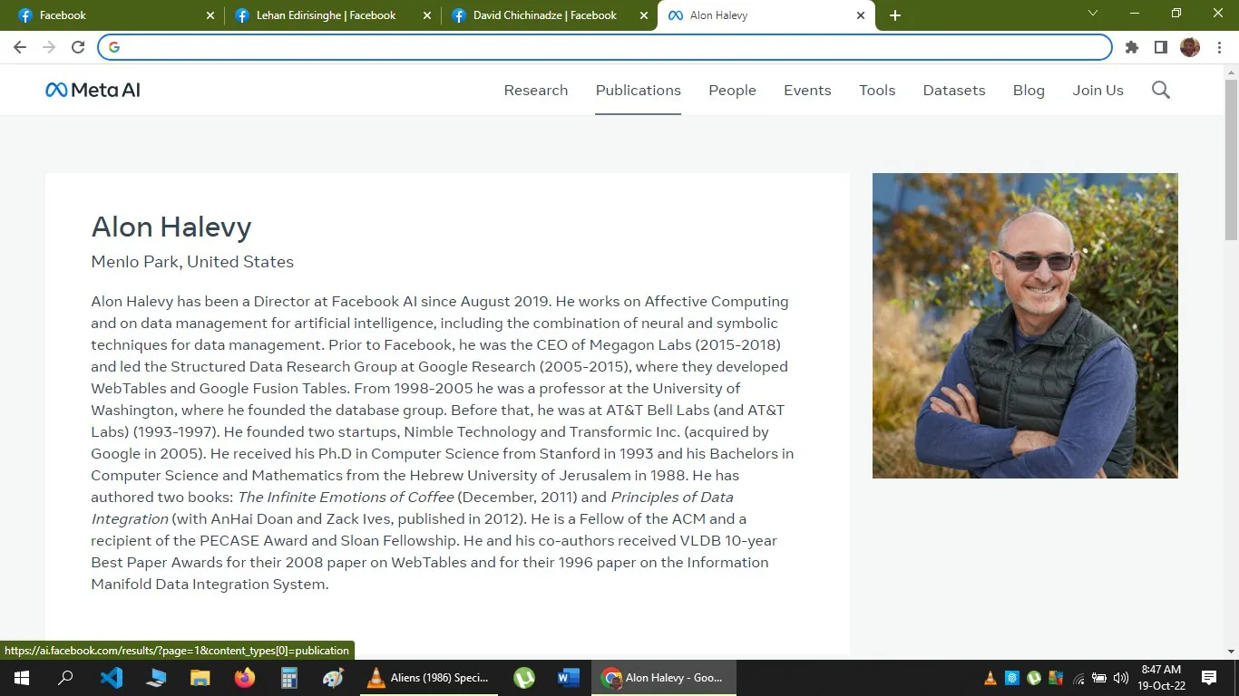 Alon Halevy's profile appears in this professional webpage screenshot from Meta AI. The page is dedicated to detailing his academic and professional background, highlighting his roles and contributions in the field of artificial intelligence and data management. Halevy is noted for his work at Facebook AI since August 2019, focusing on Affective Computing and data management techniques.
The text outlines his previous positions, including CEO of Megagon Labs and head of the Structured Data Research Group at Google Research. It also covers his academic tenure at the University of Washington, where he founded a database group. His educational background includes a Ph.D. in Computer Science from Stanford and a Bachelor's degree from the Hebrew University of Jerusalem.
The accompanying image shows Alon Halevy outdoors, smiling and casually dressed in a blue sweater and a dark vest, with trees in the background, suggesting a pleasant, relaxed atmosphere. The text also mentions his authorship of two books and various awards he has received, reflecting his esteemed position in his field.