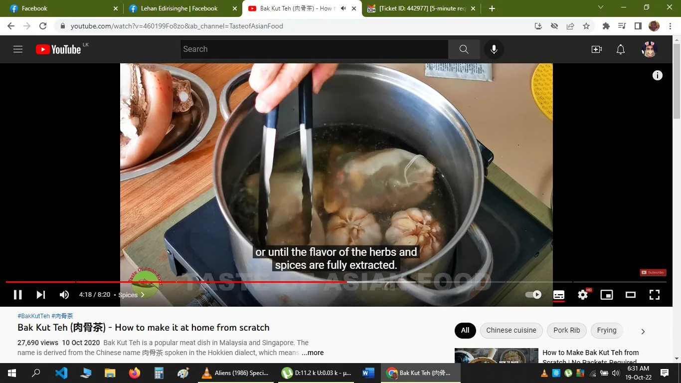 The screenshot captures a moment from a YouTube video titled "Bak Kut Teh (肉骨茶) - How to make it at home from scratch," featured on the "Taste of Asian Food" channel. The scene shows a pot on a stove, with a pair of tongs being used to handle ingredients submerged in broth. Garlic bulbs and other herbs are visible, indicating the dish's traditional preparation involving a mix of herbs and spices. A plate with a large piece of meat sits beside the pot, ready to be added. The subtitle reads, "or until the flavor of the herbs and spices are fully extracted," emphasizing the cooking process. The environment is a home kitchen, with a wooden countertop and other kitchen tools partially visible. The video discusses the preparation of Bak Kut Teh, a popular dish in Malaysian and Singaporean cuisine. The tags suggest a focus on traditional Chinese cooking techniques, particularly involving pork ribs.