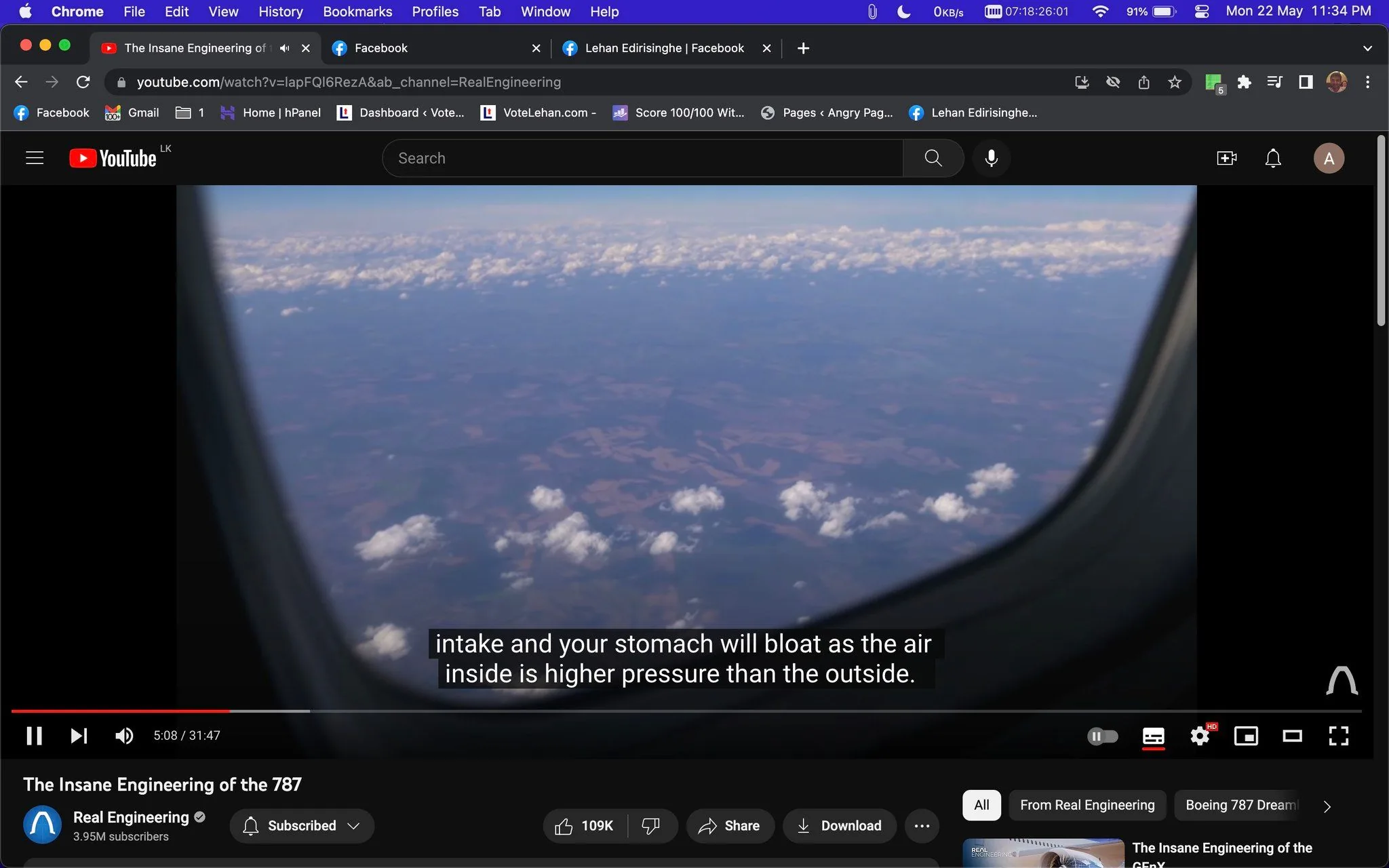 1) The screenshot depicts a YouTube video titled "The Insane Engineering of the 787," viewed through an airplane window. The scene shows an expansive aerial view of the earth below, dotted with clouds and a vast sky stretching to the horizon. The foreground features the rounded edge of the airplane window, providing a frame for the landscape outside. In the sky, scattered fluffy clouds hover over the earth, which appears to be a mixture of fields or land formations. The video is being played on the Real Engineering channel, as indicated by the channel name visible at the bottom. The video has a high number of likes, showcasing its popularity. Subtitles are visible, with text discussing the effects of air pressure on the body: "intake and your stomach will bloat as the air inside is higher pressure than the outside." The YouTube interface surrounds the video with options like share, download, and like, typical of the platform's layout. The scene captures a sense of calm and curiosity, drawing attention to the engineering marvel of flight.
2) On-screen text block:
- Title: "The Insane Engineering of the 787"
- Channel / profile: "Real Engineering"
- Site / app: "YouTube"
- Captions / subtitles: "intake and your stomach will bloat as the air inside is higher pressure than the outside."