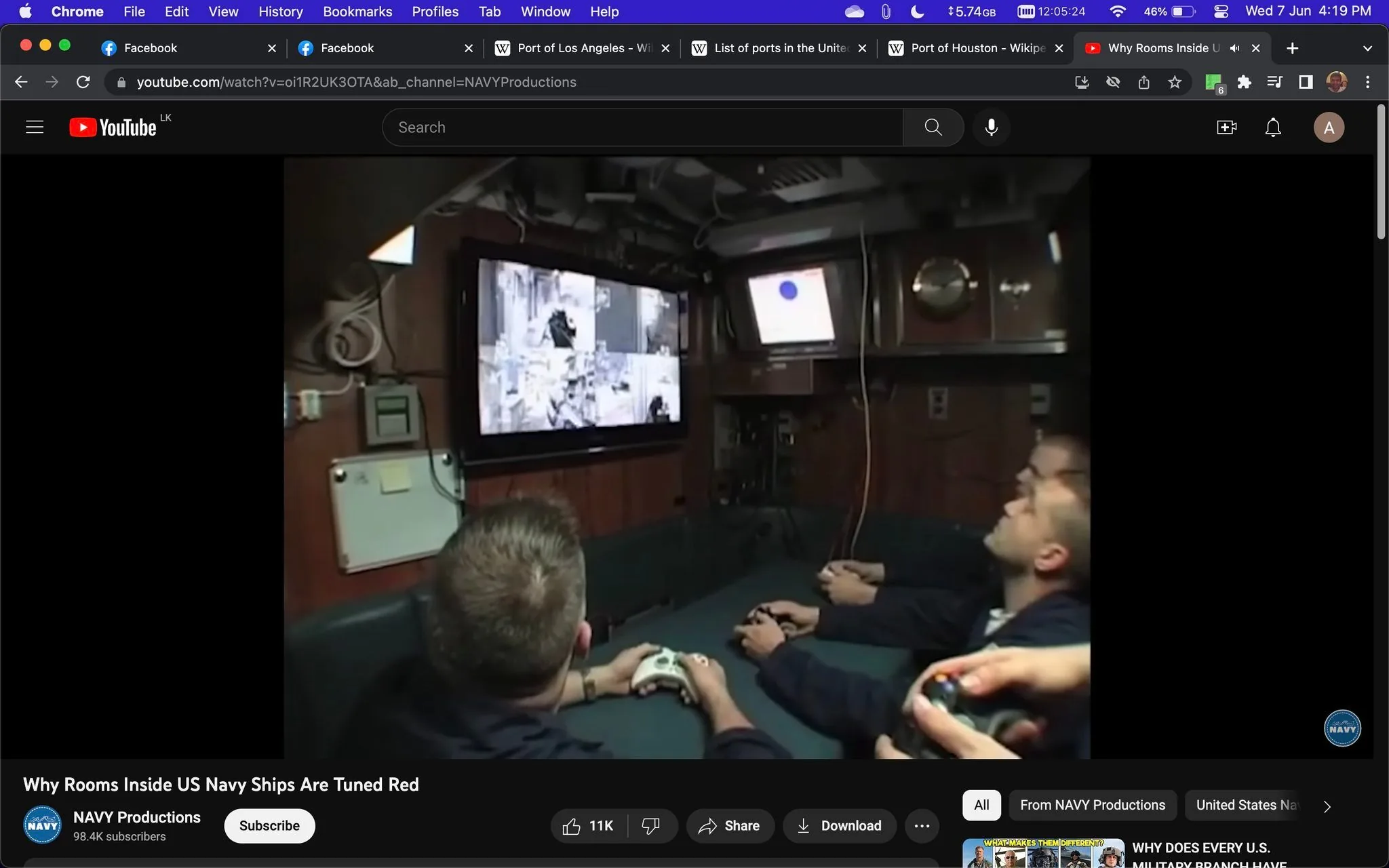 This image is a screenshot from a YouTube video titled "Why Rooms Inside US Navy Ships Are Tuned Red," hosted on the channel NAVY Productions. The scene takes place inside a room on a US Navy ship, where several individuals are gathered around a television screen, apparently engaged in a gaming session. The television displays a game with multiple camera angles, suggesting a multiplayer environment.
The setting is compact and utilitarian, with equipment and panels mounted on the wooden walls, reflecting the functional design typical of a naval ship's interior. The lighting is moderate, providing enough illumination to see the details without harsh glare. The individuals present are focused on the screen, holding gaming controllers, suggesting a moment of leisure and camaraderie among the crew. The presence of naval uniforms indicates their military affiliation.
The screenshot captures a unique juxtaposition of military life and modern gaming culture, highlighting a recreational aspect aboard a Navy vessel. There is a sense of relaxation and engagement as the crew members enjoy a break from their duties. The video title suggests a discussion about the use of red lighting in Navy ship rooms, possibly related to preserving night vision or other operational reasons.