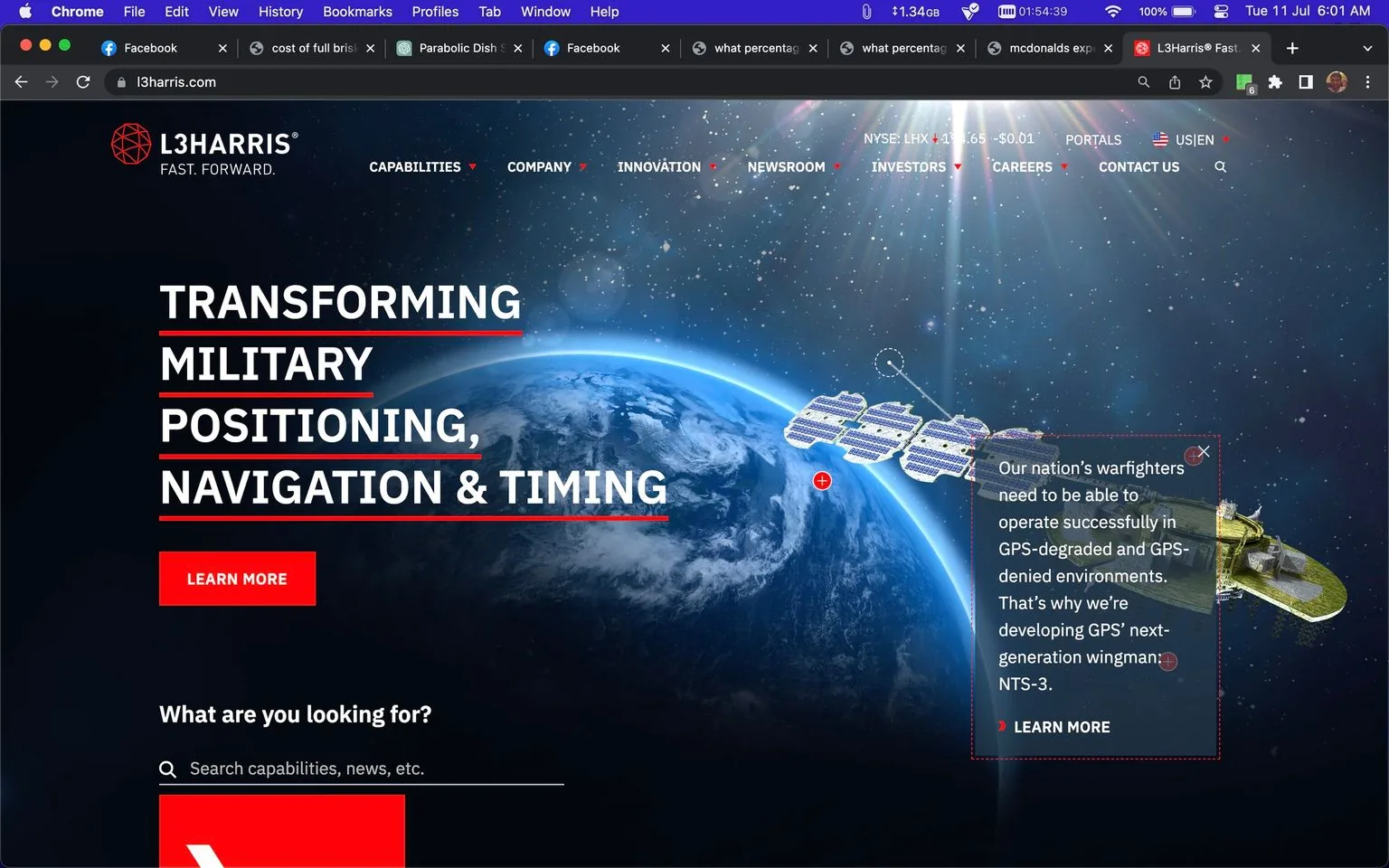 The screenshot is from the homepage of the L3Harris website. Dominating the image is a view of Earth from space, partially illuminated, set against a starry backdrop. A satellite, depicted near the planet, signifies the company's focus on advanced technology. The text "TRANSFORMING MILITARY POSITIONING, NAVIGATION & TIMING" is prominently displayed, emphasizing their role in military advancements. Another text box describes the development of GPS technology like the NTS-3 to enhance capabilities in challenging environments. The header includes navigation options such as "CAPABILITIES," "COMPANY," "INNOVATION," and more, suggesting a comprehensive site structure. The page has a dark theme, with red elements highlighting important sections. The overall mood is futuristic and professional, aligning with L3Harris’ branding as a technological leader.