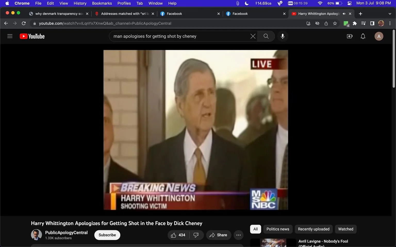 In this video frame, Harry Whittington is seen speaking at a press conference. The setting appears to be a formal, possibly governmental or public venue, indicated by the background elements like a brick wall and the presence of other suited individuals. Whittington, wearing a dark suit, white shirt, and orange-brown tie, is positioned at the center of the composition, suggesting he is the main speaker. His expression appears serious and composed as he addresses the audience. The image is captioned "LIVE" in the corner, emphasizing the immediacy of the broadcast. The on-screen text identifies Whittington as a "SHOOTING VICTIM," and the network MSNBC's logo is visible in the bottom right corner. The overall mood is somber and formal, consistent with a serious public statement or apology. The lighting is natural, likely daylight, suggesting the event occurs in the morning or afternoon.