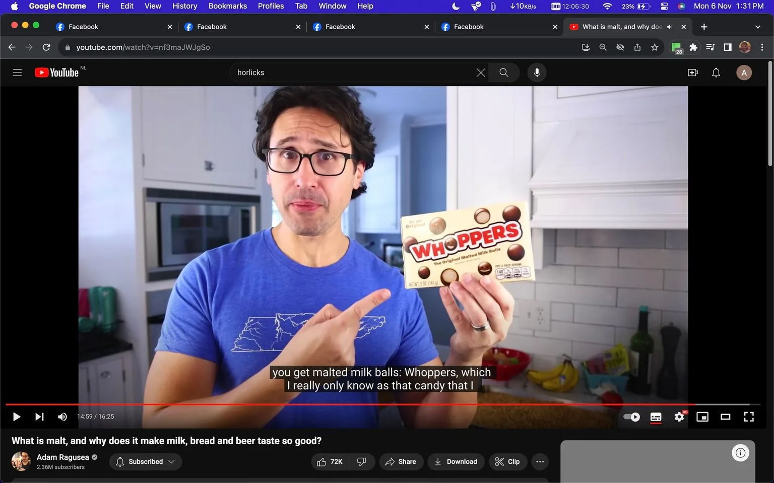 In this screenshot, Adam Ragusea is featured in a kitchen setting, presenting a box of "WHOPPERS The Original Malted Milk Balls." Adam is wearing a blue T-shirt with a graphic design and glasses, giving a focused and slightly amused expression as he points to the candy box. The kitchen background is modern with white cabinetry and a tiled backsplash, creating a clean and bright atmosphere. Visible are kitchen items like a microwave, bananas, and a few bottles, adding a casual, lived-in feel to the scene.
The YouTube interface is visible, showing that the video is nearly completed at 14:59 of a 16:25 runtime. The title of the video is "What is malt, and why does it make milk, bread and beer taste so good?" and it is published on Adam Ragusea's channel, which has 2.36M subscribers. The focus is on explaining malt, with the specific moment discussing malted milk balls. The caption on the screen reads, "you get malted milk balls: Whoppers, which I really only know as that candy that I," indicating a lighthearted tone typical of Adam Ragusea's content.