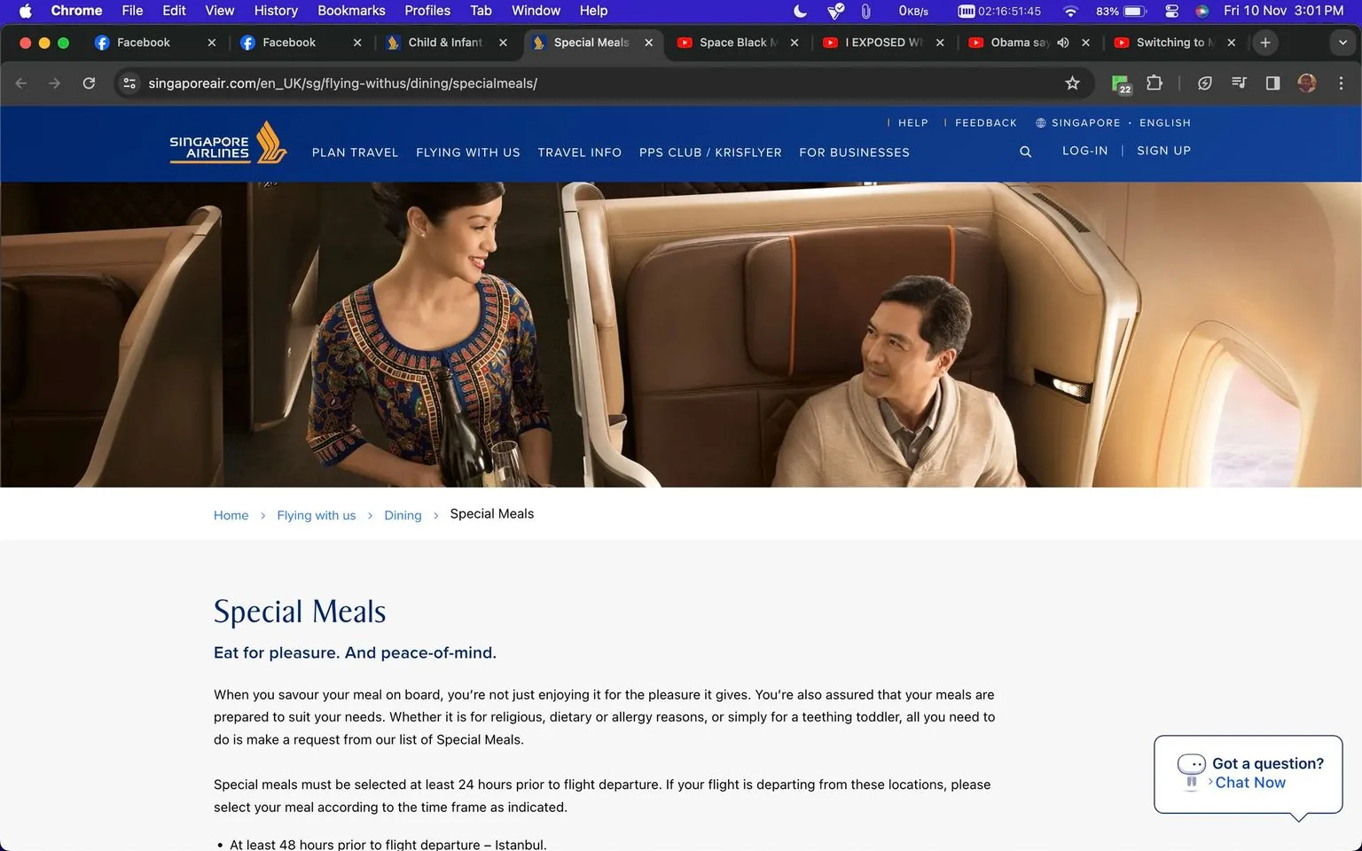 The image is a screenshot from the Singapore Airlines website, specifically the "Special Meals" page. It features a scene inside an aircraft cabin where a flight attendant is serving a passenger. The flight attendant, dressed in the signature Singapore Airlines uniform with a vibrant batik pattern, is holding a tray with a bottle, possibly wine, as she smiles and engages with the passenger seated in a luxurious first-class seat. The passenger, wearing a light-colored sweater, is looking up at her with a pleasant expression, suggesting a polite interaction. The lighting is warm, giving a cozy and comfortable atmosphere typical of premium airline experiences.
In the background, the plush upholstery and individual seat space imply a high-end service environment, while a window reveals a glimpse of the sky outside, enhancing the in-flight setting. Below the image, the text highlights the airline's commitment to providing tailored dining experiences, emphasizing the importance of requesting special meals at least 24 hours before the flight. The website's navigation bar is visible at the top, showing various travel-related options available to users.
- Title: "Special Meals"
- Site / app: "Singapore Airlines"