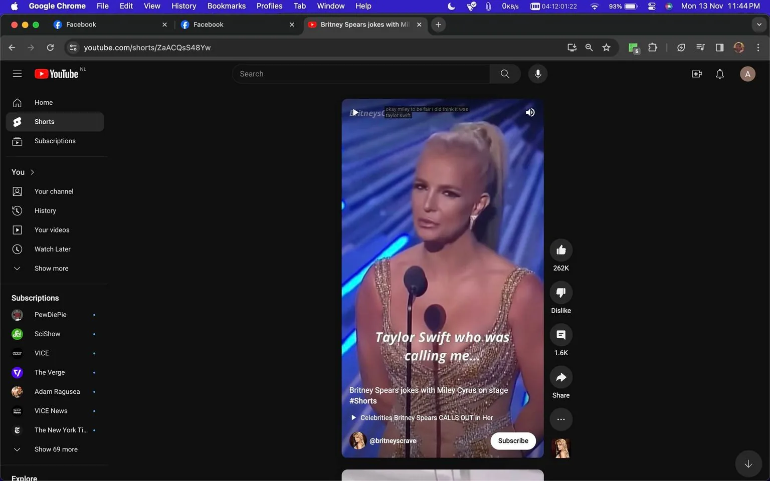 This image is a screenshot from a YouTube Shorts video featuring Britney Spears. She is speaking on stage, likely at an award show, as indicated by the microphone and the formal setting. Britney is dressed in a glamorous, sparkly gold outfit with her hair styled in a high ponytail. Her expression appears serious, fitting with the formal environment of the event.
The subtitles suggest a playful interaction or joke involving Miley Cyrus and Taylor Swift, with Britney humorously mentioning a call from Taylor Swift. This is supported by the title of the video, "Britney Spears jokes with Miley Cyrus on stage #Shorts," which suggests a lighthearted moment between the celebrities. The video is hosted on the "@britneyscrave" channel, implying a focus on Britney Spears content.
The YouTube interface is visible, showing the video has received significant engagement with 262K likes. The setting and lighting are typical of a stage performance, with bright, focused lights highlighting Britney. The background features abstract blue patterns, enhancing the stage's formal aesthetic. The layout includes typical YouTube elements like the like/dislike buttons, comment count, and sharing options.