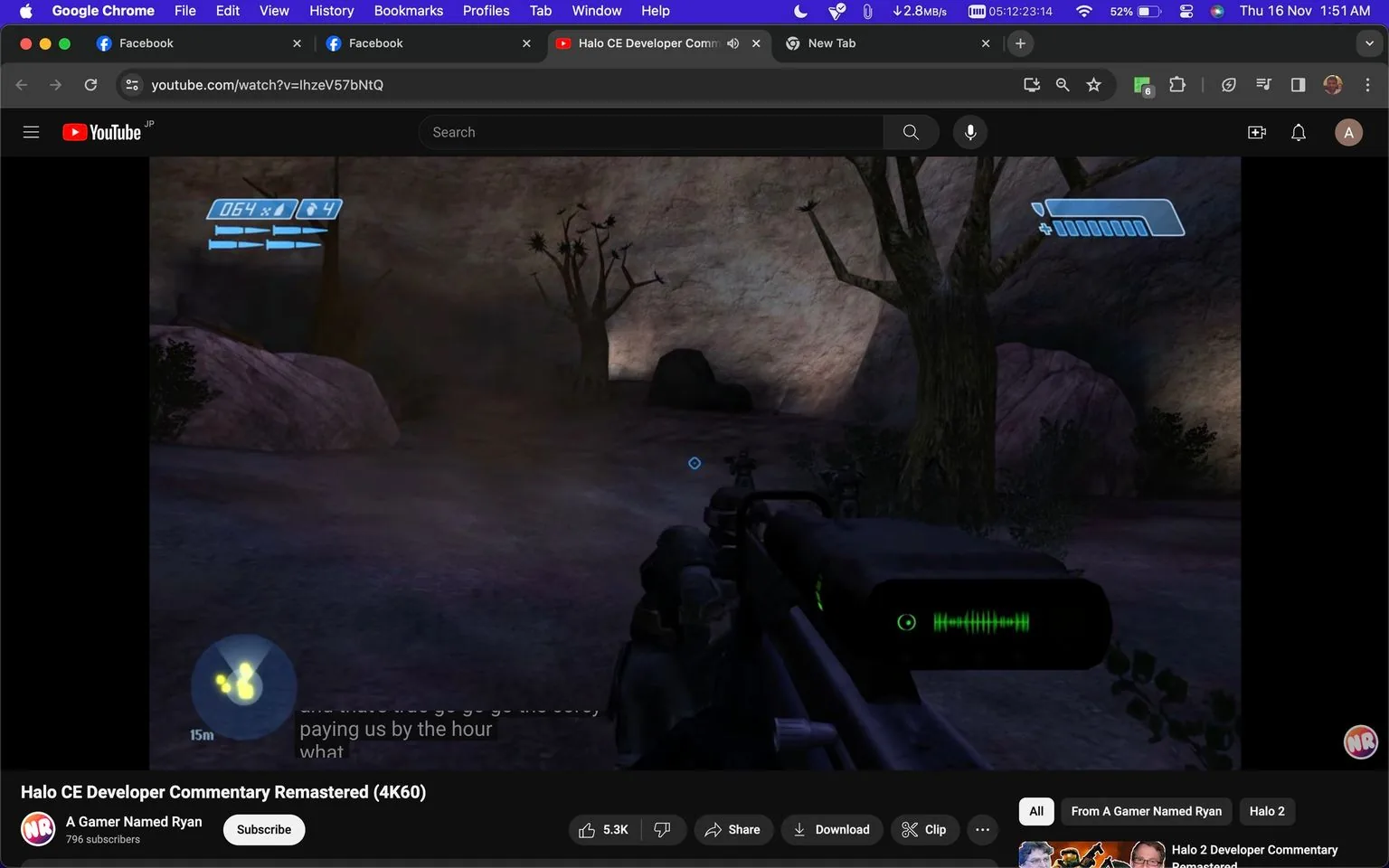 The screenshot captures a YouTube video titled "Halo CE Developer Commentary Remastered (4K60)" from the channel "A Gamer Named Ryan." The video displays gameplay footage of "Halo," specifically in a first-person shooter format. The player character is aiming a weapon in an outdoor setting, depicted with rocky terrain and sparse trees under dim lighting. The game's user interface is visible, showing health and shield indicators, ammunition count, and a radar at the bottom left. The on-screen text includes a small portion of subtitles, reading "paying us by the hour," suggesting dialogue or commentary. The image shows that this is an active gameplay moment with a reticle centered on the screen, indicative of the player preparing to engage. The desktop view includes browser tabs and a visible URL link for the video, enhancing the context of this being a screen capture from a viewer's perspective.
- Title: "Halo CE Developer Commentary Remastered (4K60)"
- Channel / profile: "A Gamer Named Ryan"
- Site / app: "YouTube"
- Captions / subtitles: "paying us by the hour"