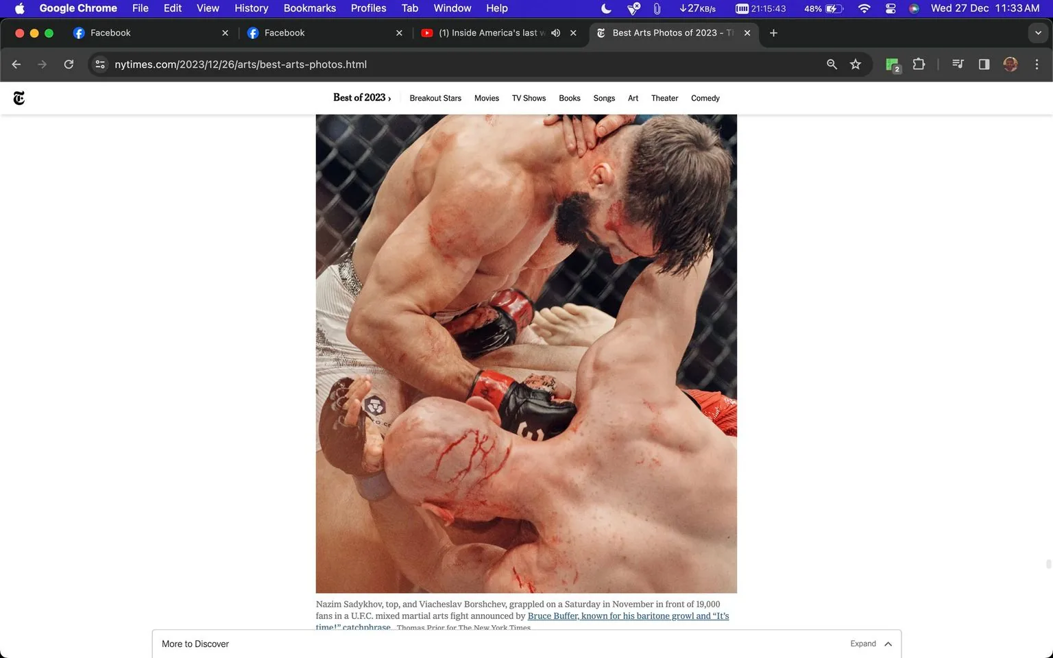 The image showcases an intense moment from a UFC mixed martial arts fight, featuring Nazim Sadykhov and Viacheslav Borshchev. The scene captures the raw physicality and determination typical of the sport. Sadykhov is positioned on top, exerting pressure on his opponent, Borshchev, who is on the ground. Both fighters are visibly bruised and bloody, highlighting the brutal nature of the match. They are inside the octagonal caged ring, which is a signature setting for UFC events. The lighting is bright and focused, emphasizing the fighters' muscular build and the dramatic tension of their struggle. The backdrop is blurred, drawing attention to the action and intensity in the foreground. The fighters are wearing MMA gloves, and the expressions on their faces convey determination and resilience. The event was announced by Bruce Buffer, known for his iconic "It’s time!" catchphrase, adding to the high-stakes atmosphere of the match.
- Title: "Best Arts Photos of 2023"
- Site / app: "nytimes.com"
- Key OCR Lines: "Nazim Sadykhov, top, and Viacheslav Borshchev, grappled on a Saturday in November in front of 19,000 fans in a U.F.C. mixed martial arts fight announced by Bruce Buffer, known for his baritone growl and “It’s time!” catchphrase."