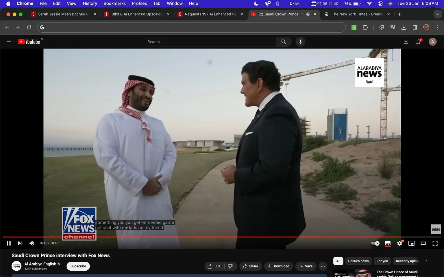 1) Rich description: The image is a screenshot from a YouTube video titled "Saudi Crown Prince interview with Fox News," hosted on the Al Arabiya English channel. The scene captures an outdoor interview between Bret Baier and another individual, who is likely a significant figure given the context. Bret Baier stands on the right, engaged in conversation, dressed in a formal dark suit with a white shirt and tie. His expression is attentive and interested. On the left, the other person wears traditional Middle Eastern attire, a white thobe, and a red and white checkered keffiyeh, appearing relaxed and smiling. The setting is an open outdoor space with a grassy path and some construction visible in the background, suggesting an urban or developing area. The lighting is natural, typical of early evening or morning, creating a calm and professional atmosphere. The Fox News and ALARABIYA news logos appear on the screen, reinforcing the news interview context.
2) On-screen text block:
- Title: "Saudi Crown Prince interview with Fox News"
- Channel / profile: "Al Arabiya English"
- Site / app: "YouTube"
- Captions / subtitles: "something you get on a video game", "get on it with my kids on my friend"