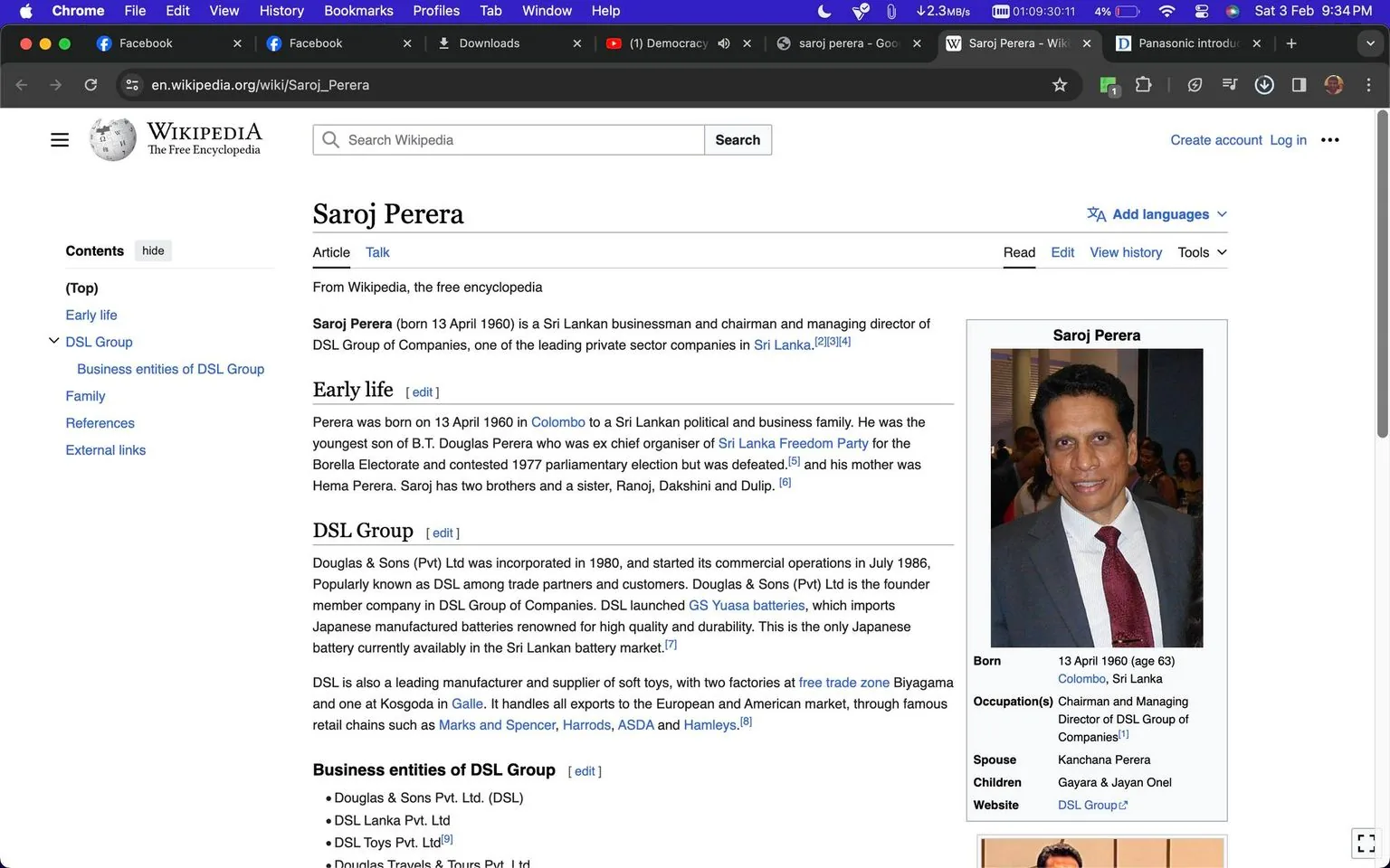 1) Rich description (8–12 sentences): The screenshot features a Wikipedia page about Saroj Perera, a Sri Lankan businessman. The page outlines his role as the chairman and managing director of the DSL Group of Companies. The top of the page displays his name and a brief introduction, highlighting his significance in the Sri Lankan business sector. A table on the right side provides key personal details, including his birthdate, occupation, and family information. There is a portrait of Saroj Perera wearing a suit and tie, smiling in a formal setting, likely indicating his professional demeanor. The page is structured with sections such as "Early life" and "DSL Group," detailing his background and the company's history. The DSL Group is noted for its incorporation in 1980 and for launching Yuasa batteries in Sri Lanka. The page lists the business entities under DSL Group, including Douglas & Sons Pvt. Ltd. The screenshot captures parts of the browser interface, with tabs open and a search bar visible at the top.
2) On-screen text block:
- Title: "Saroj Perera - Wikipedia"
- Site / app: "Wikipedia"