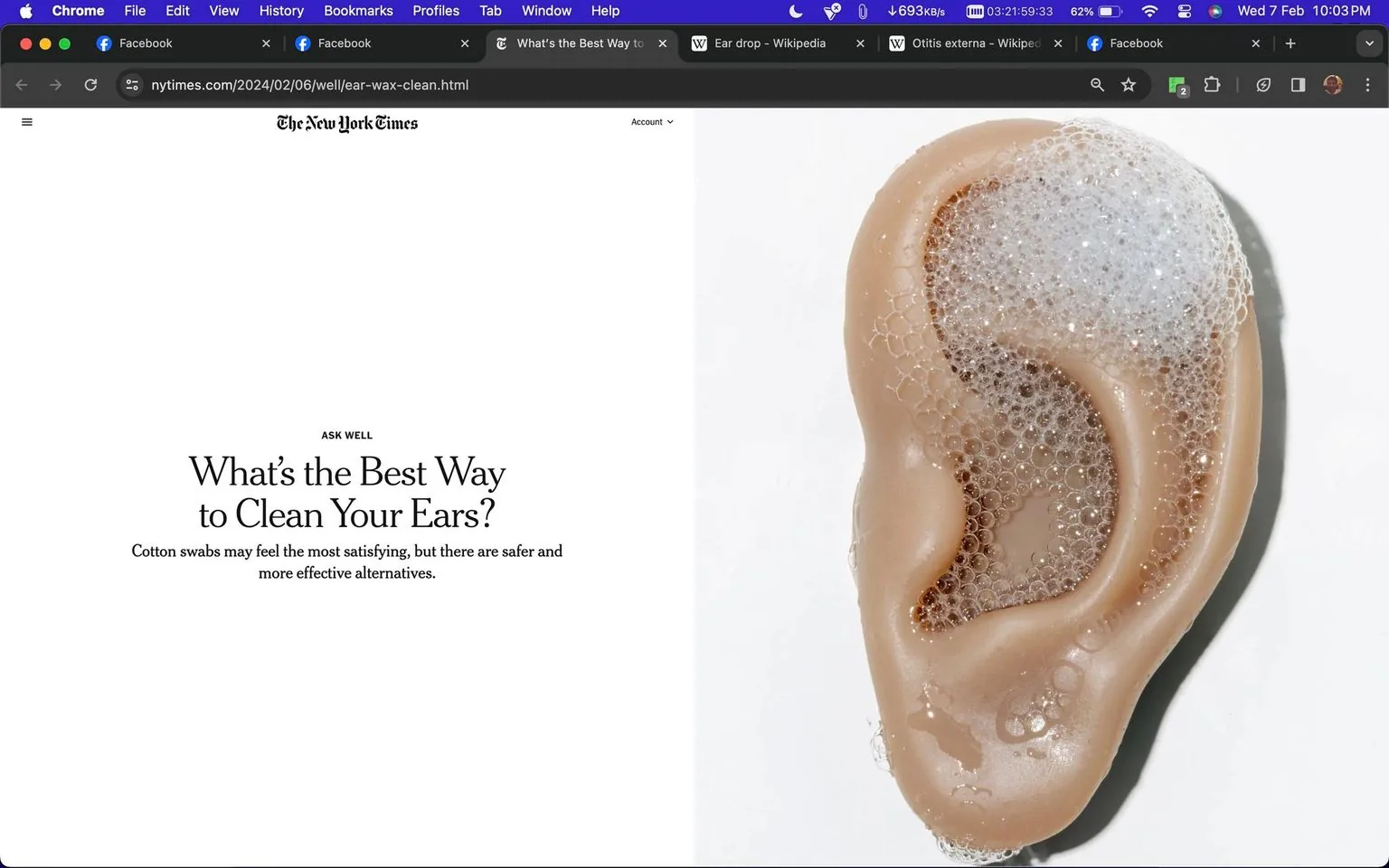 The screenshot captures a webpage from The New York Times. The page is primarily white with black text and features the headline, "What's the Best Way to Clean Your Ears?" Below the title, it mentions that while cotton swabs might be satisfying, there are safer and more effective alternatives. This text is part of a column called "Ask Well." On the right side of the screen, there is a compelling visual of an ear shaped object covered with soap bubbles, symbolizing ear cleaning. The layout suggests a modern and clean design typical of The New York Times website. At the top of the screen, tabs for Facebook, Wikipedia, and other pages are visible, indicating the browser environment on a desktop. The article seems to address ear hygiene, advising on better practices than using cotton swabs.