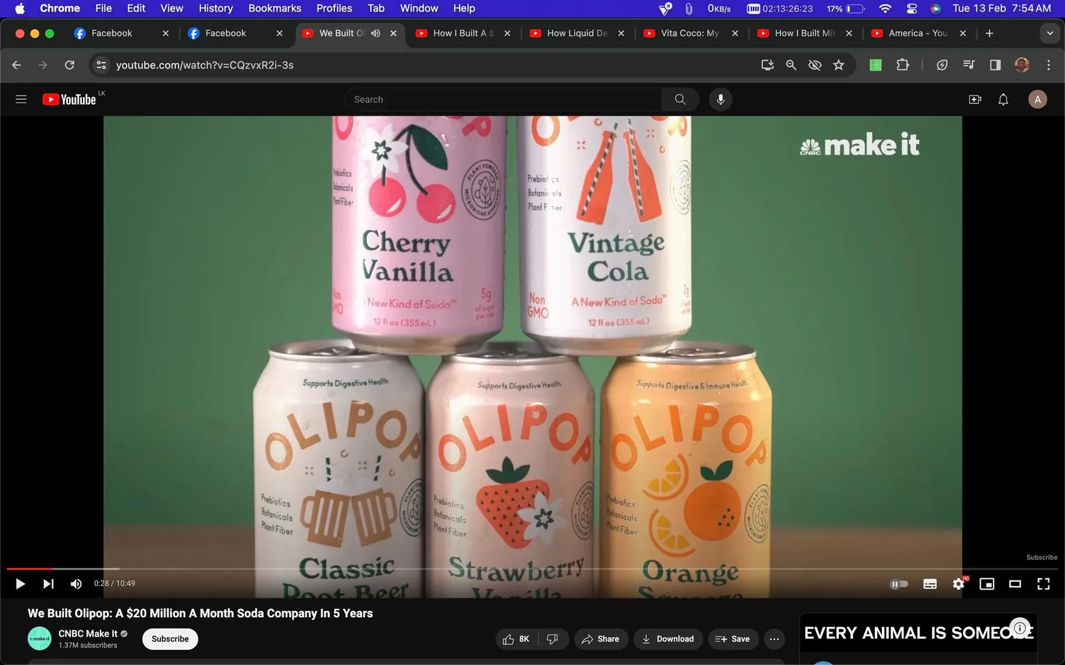 1) Rich description: The image is a screenshot from a YouTube video titled "We Built Olipop: A $20 Million A Month Soda Company In 5 Years," presented by the channel CNBC Make It. The screenshot displays a stack of Olipop soda cans arranged in a pyramid formation against a green background. The top row features Cherry Vanilla and Vintage Cola flavors. The middle row, slightly obscured, shows Classic Root Beer and Strawberry Vanilla. The bottom can is Orange Squeeze. Each can is designed with vibrant colors and illustrations that represent the flavor, such as cherries for Cherry Vanilla and oranges for Orange Squeeze. The Olipop branding is prominently displayed on each can, along with claims like "Supports Digestive Health" and "Non-GMO." The composition is well-lit, with a focus on the colorful cans to highlight the product's appeal. The image effectively conveys the brand's emphasis on variety and health-focused ingredients.
2) On-screen text block:
- Title: "We Built Olipop: A $20 Million A Month Soda Company In 5 Years"
- Channel / profile: "CNBC Make It"
- Site / app: "YouTube"