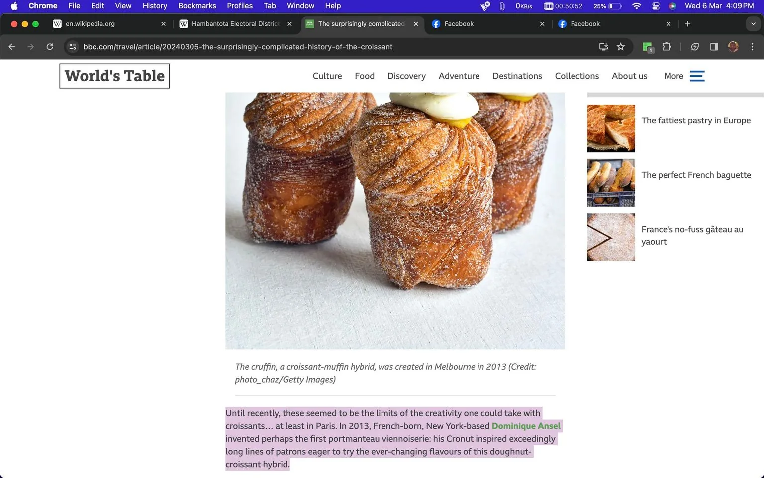 The image is a screenshot from a BBC article titled "The surprisingly complicated history of the croissant." It features a close-up of "cruffins," which are a croissant-muffin hybrid, displayed on a white surface. The cruffins appear golden-brown with a sugar coating and have a distinct, layered texture. They're topped with a dollop of cream or frosting. The article discusses the innovation in pastry creations, mentioning Dominique Ansel, a French-born, New York-based pastry chef known for creating the "Cronut," a doughnut-croissant hybrid. The highlighted text at the bottom details how the Cronut was a significant invention that drew large crowds eager to try the unique flavors. The site features tabs for different sections like Culture, Food, and Discovery, with a sidebar showing related articles such as "The fattiest pastry in Europe" and "The perfect French baguette." The image credit is given to photo_chaz/Getty Images. The screenshot captures the essence of culinary creativity and innovation in pastries.