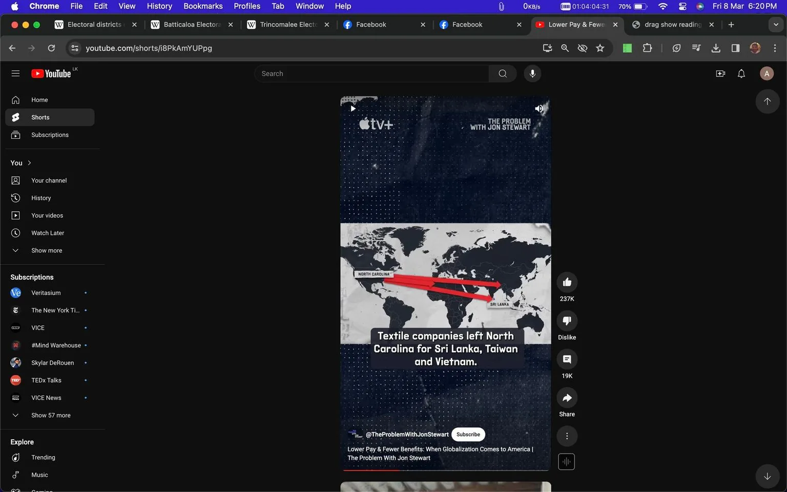 ```
The image is a screenshot from YouTube, displaying a short video from the channel "@TheProblemWithJonStewart." The video is titled "Lower Pay & Fewer Benefits: When Globalization Comes to America | The Problem With Jon Stewart," and it is associated with Apple TV+. The background shows a world map highlighting North Carolina with lines pointing to Sri Lanka, Taiwan, and Vietnam, indicating a shift in the textile industry. The text overlay reads, "Textile companies left North Carolina for Sri Lanka, Taiwan and Vietnam." The interface is in dark mode, with visible elements such as the viewer's subscriptions, the like and dislike buttons, and the option to share the video. The overall theme is centered around globalization and its impact on the textile industry.